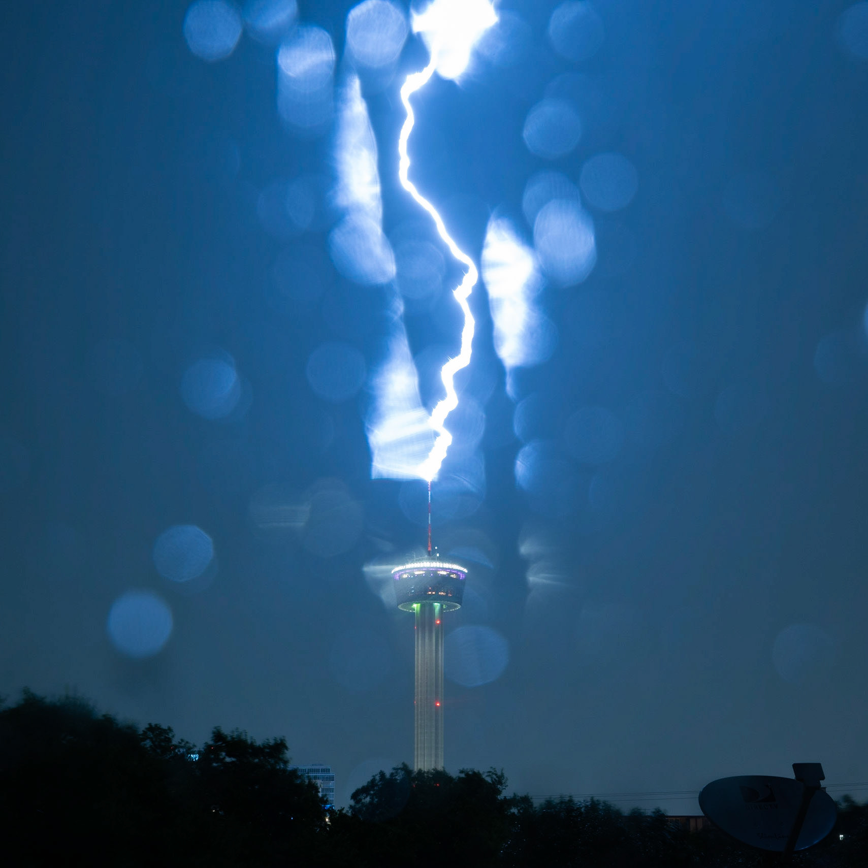 Tower Strike Behind Wet Window
