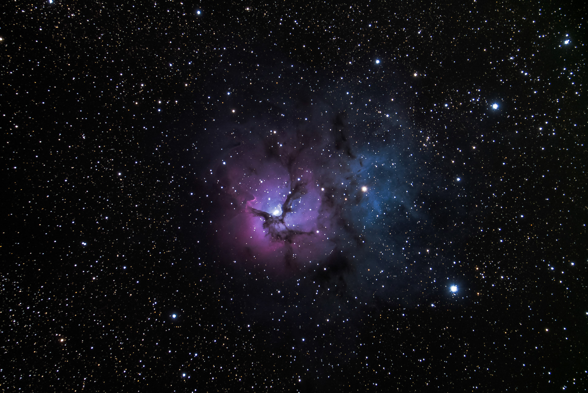 Messier 20, or M20. H II region in Saggitarius. Star-forming region.