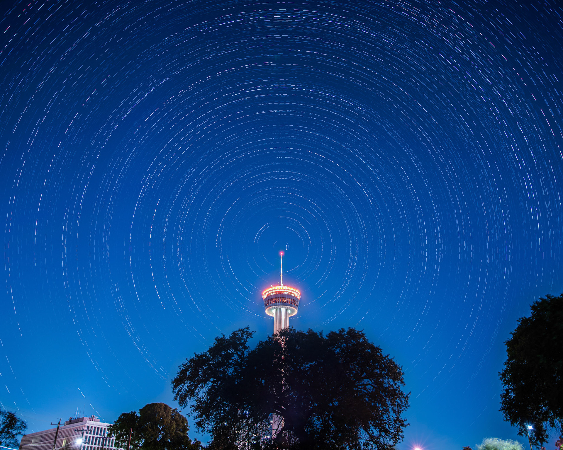 Morse code star trails with orange tower
