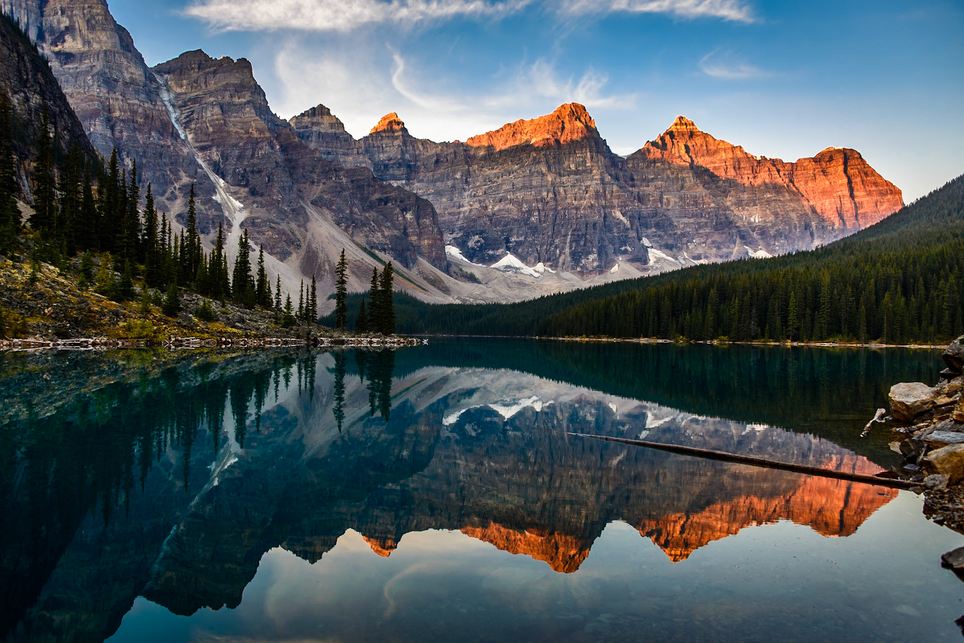 Blessed by a perfectly still morning, I liked how even the wispy clouds were captured in the reflection. Moraine Lake, Alberta, Canada