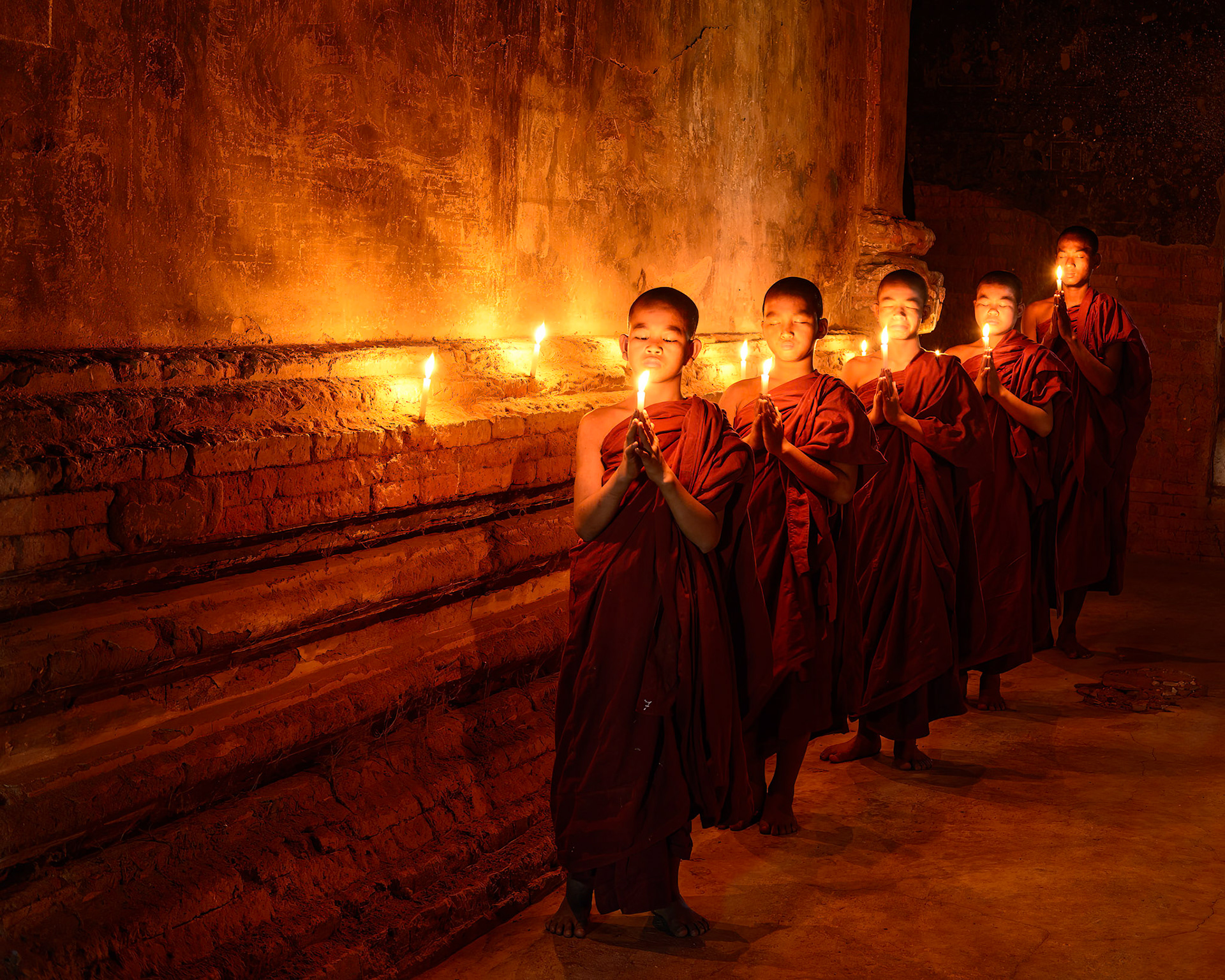 Five novice monks are focused for one brief moment