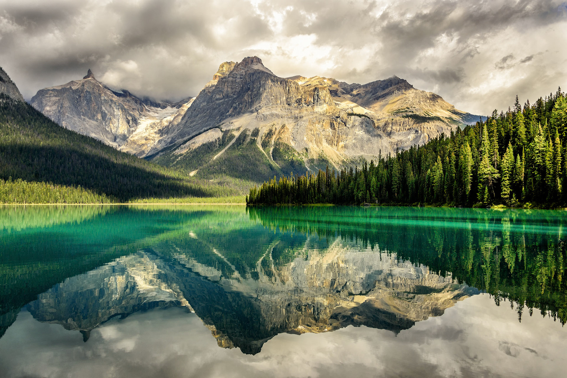 As we walked around Emerald Lake, the stormy weather paused, the wind calmed and the sun broke through, but just for a minute