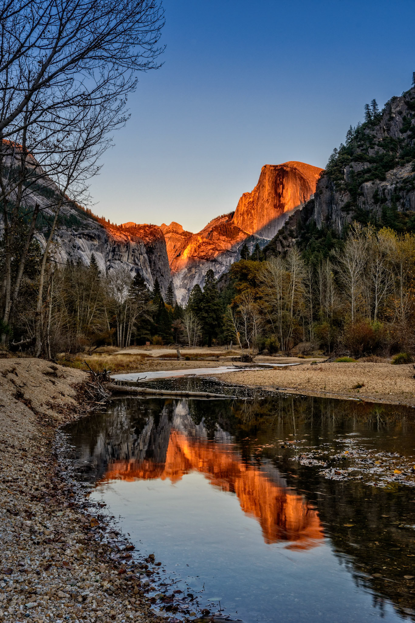 It was my first night in the park in over 35 years and my heart was set on capturing the light on half dome at sunset reflecting in the Merced River. However, due to the drought conditions in the area, the Merced River was all but a trickle. It took a bit of exploring to find the spot matched the image in my mind.