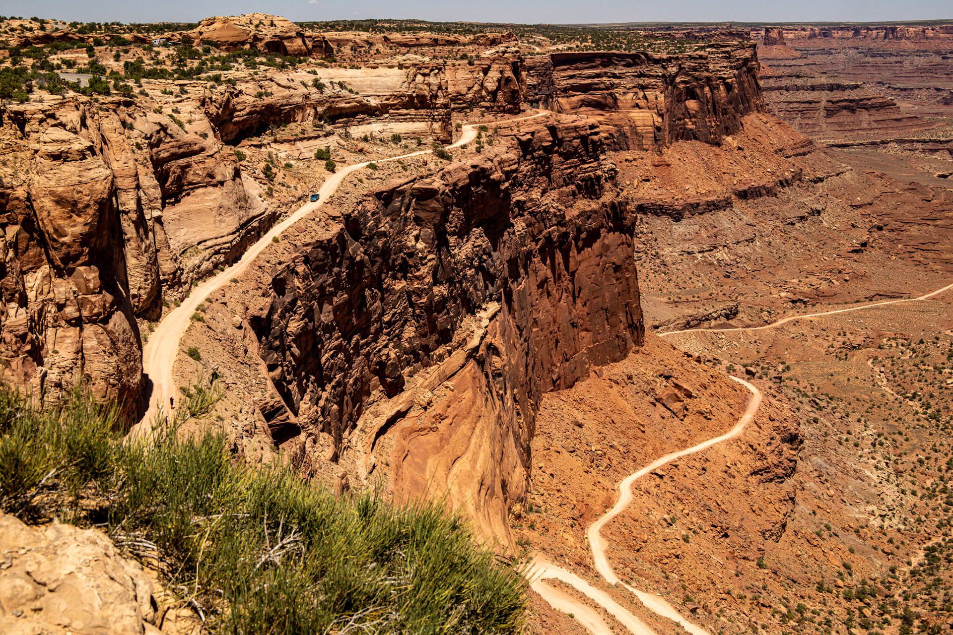 The Schafer Trail is a scenic, unpaved 4x4 backcountry route that descends 1,500 feet via dramatic switchbacks from the Island in the Sky mesa top toward the Colorado River