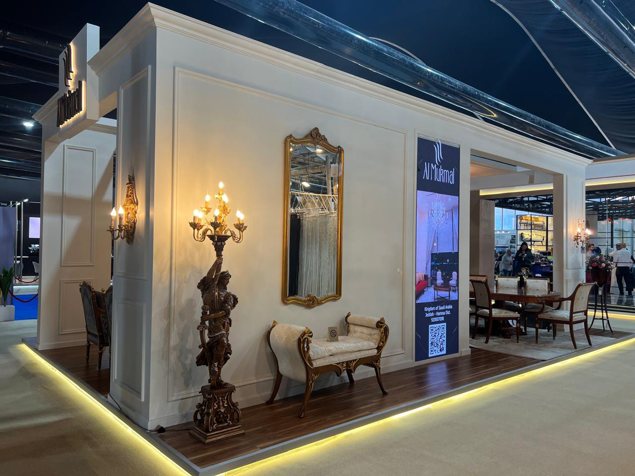 Outside left side of the Al Mukmal booth, showcasing the open space and beautiful design coordination.