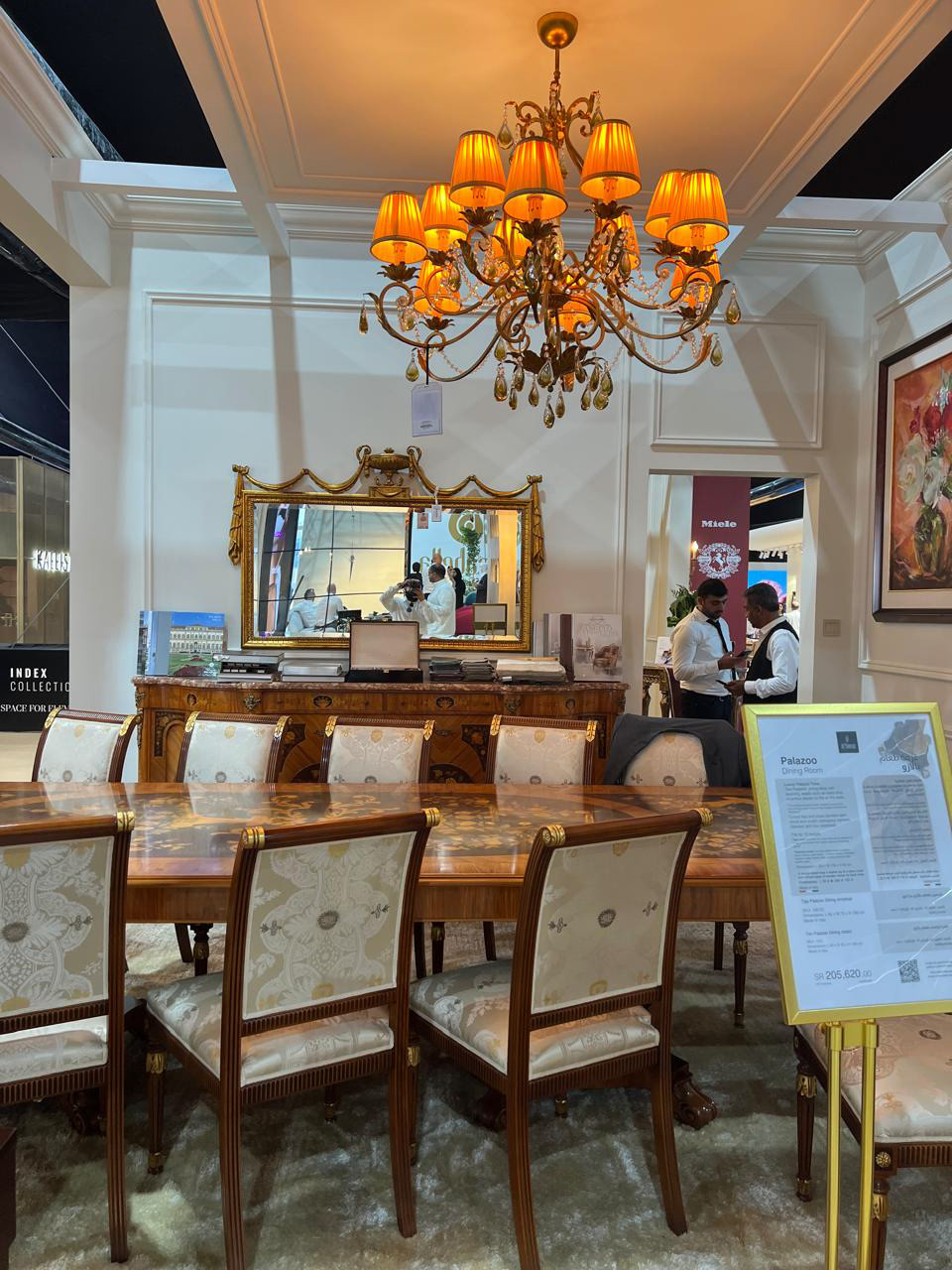 Inside the booth from the other side, displaying luxurious interior coordination and areas designed for guest interaction.