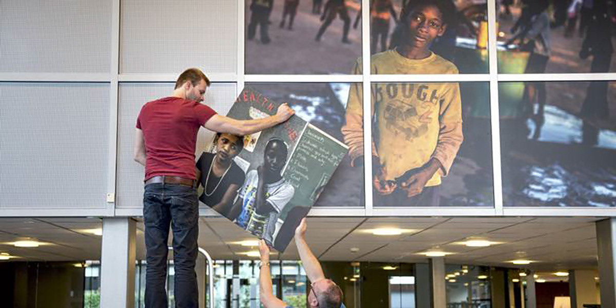 Putting up the images for the exhibition.