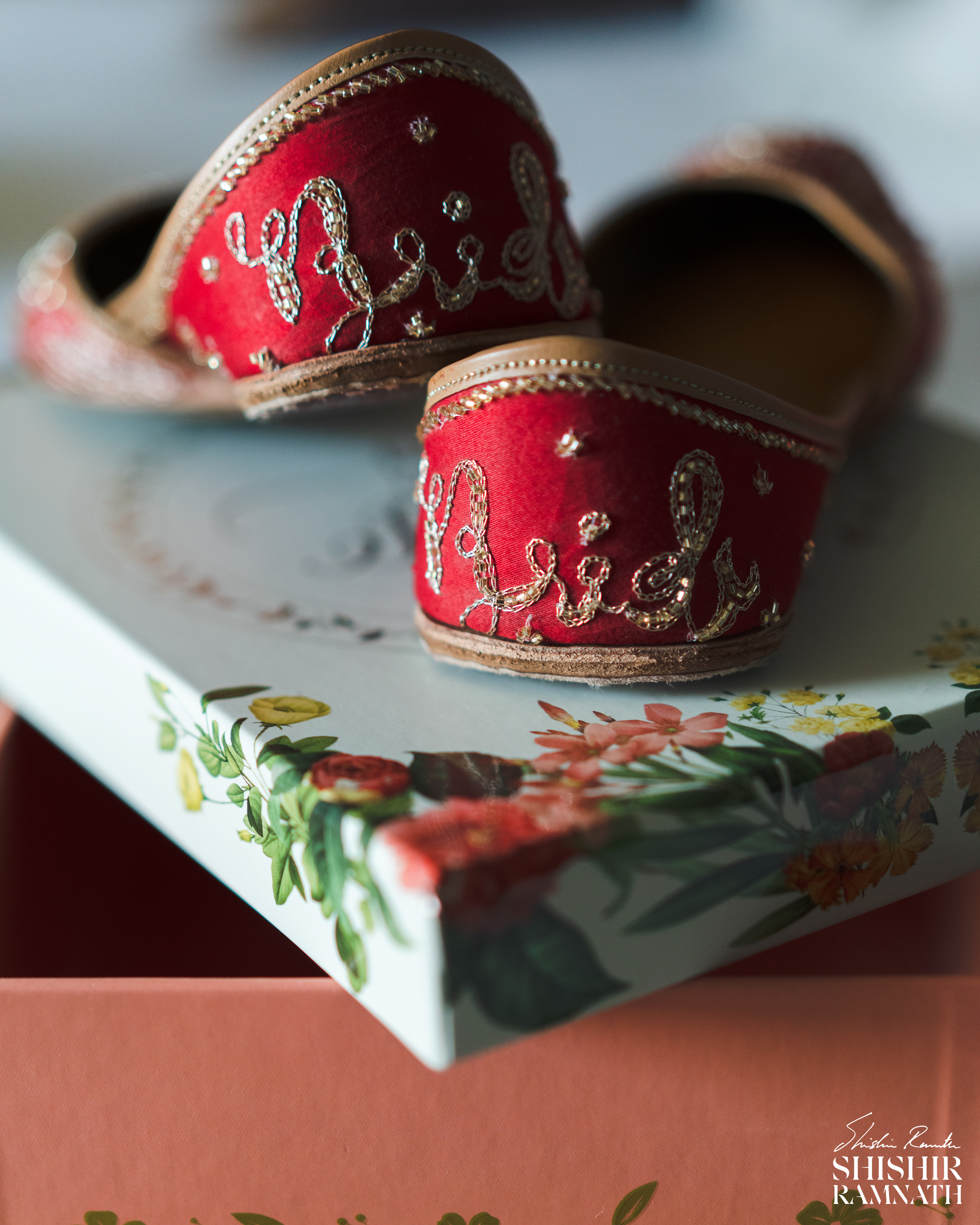 bridal slippers from fizzy goblet red in color and sharp focus on the letters