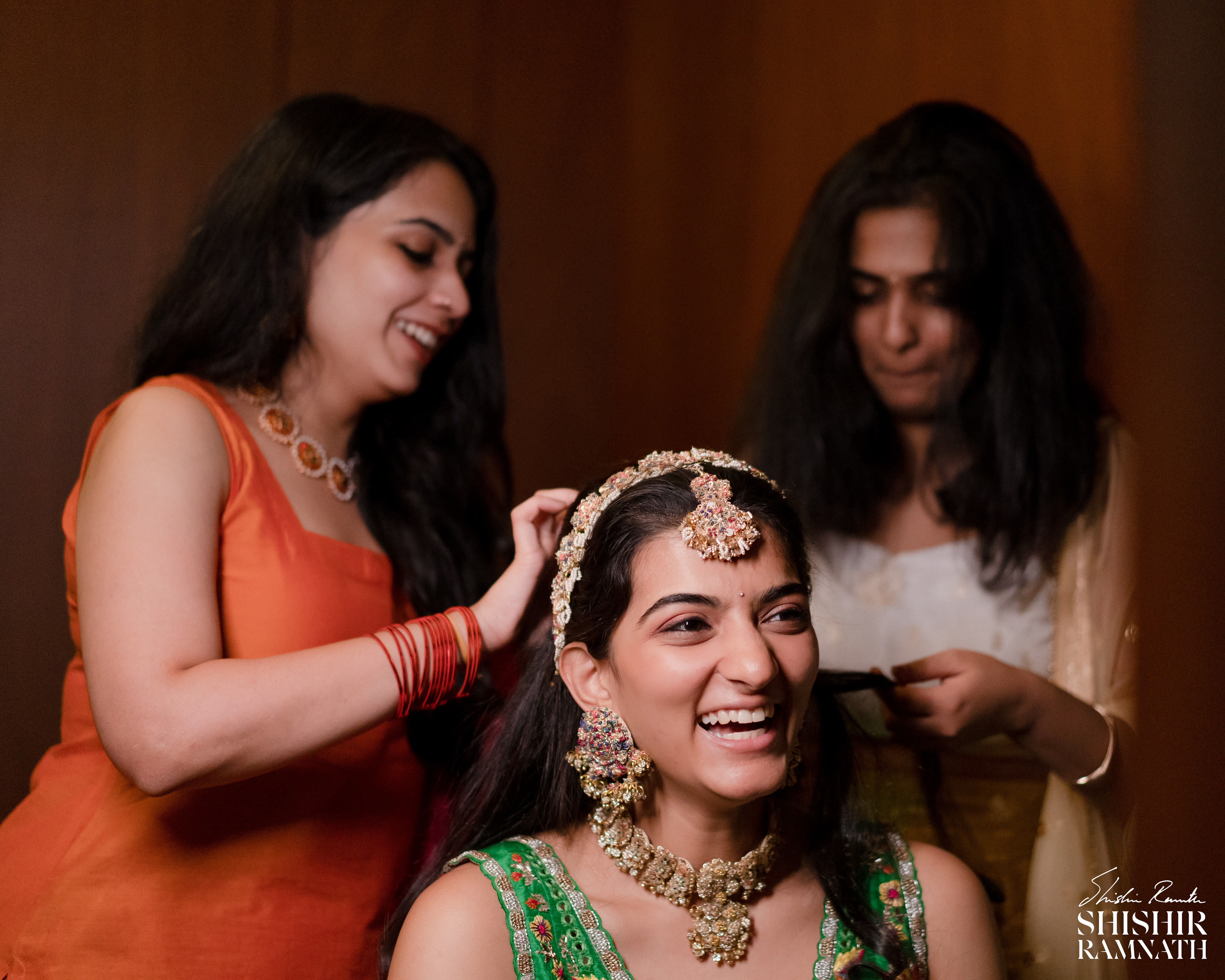 Indian brde getting ready for her mehndi with her friends in hyderabad, india