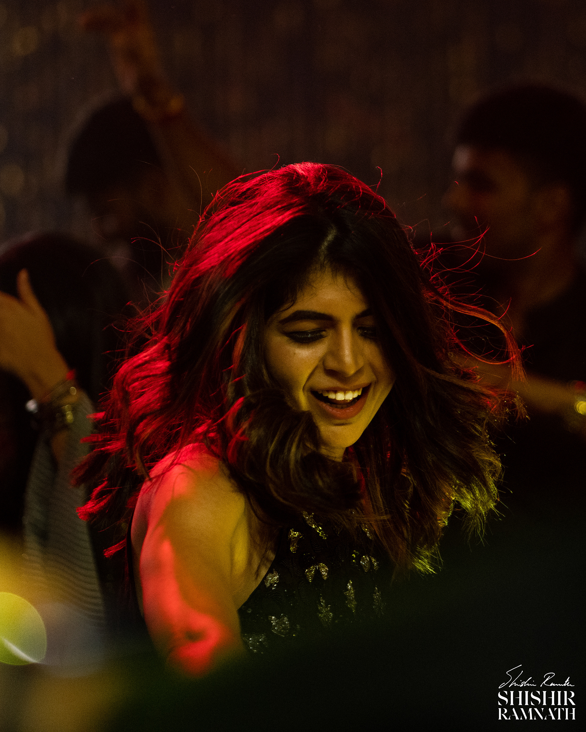 bridesmaid dancing the night awy at a coktail party indian wedding 