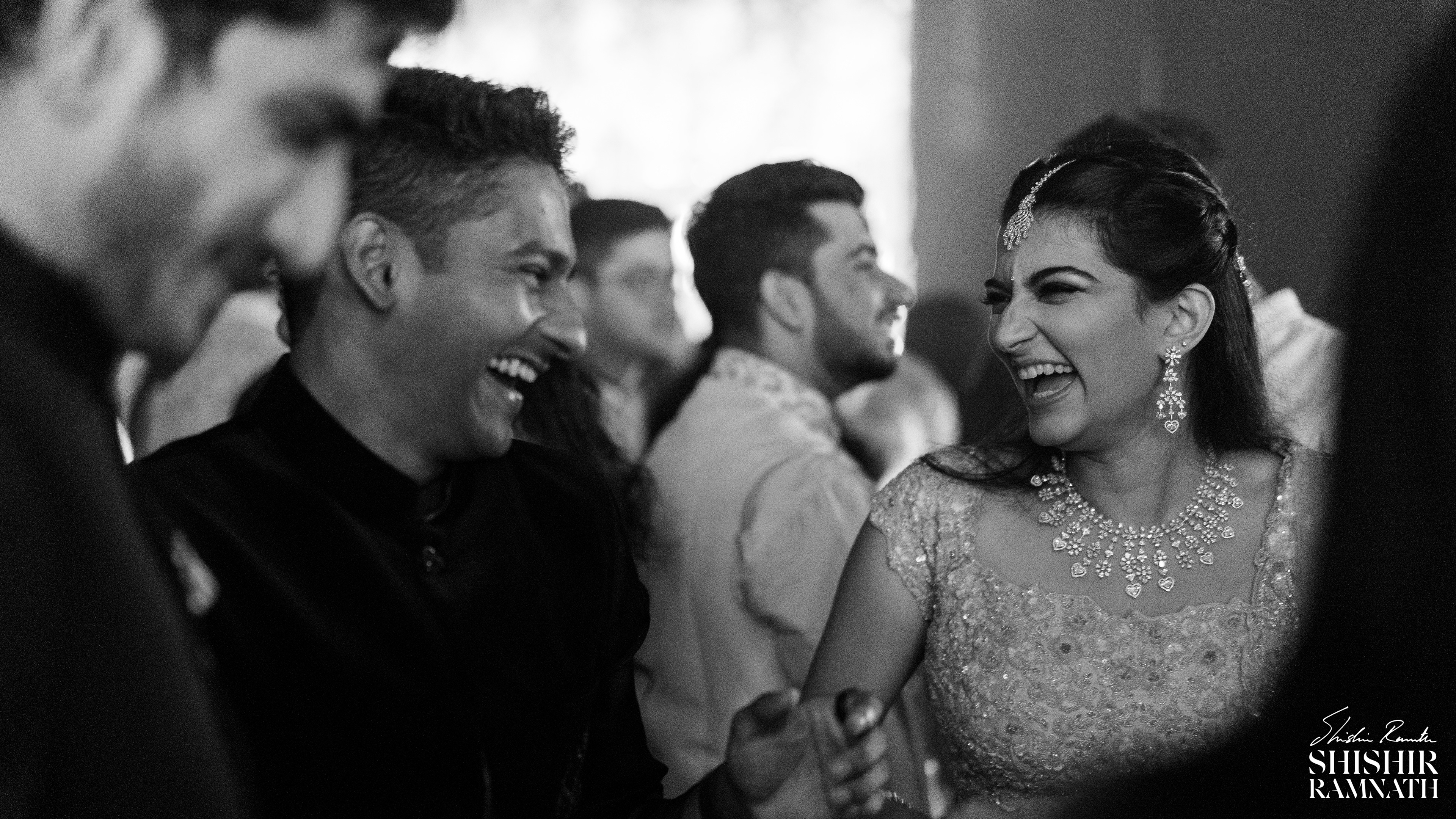 friends having a fun moment at a cocktail party in hyderabad