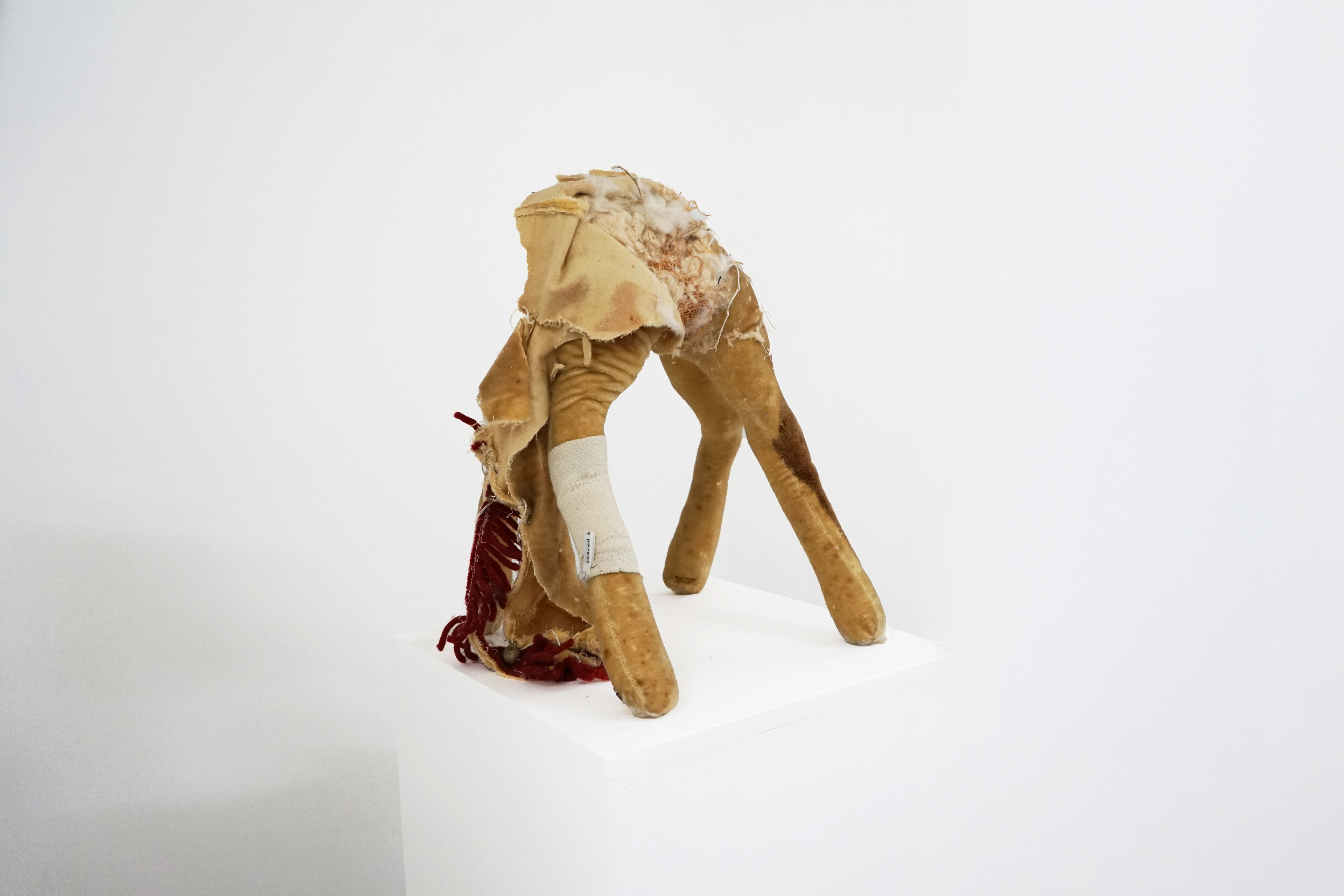 Born To Die, Dean Hoy, Soft toy, kapok, embroidery thread, straw, wire, and a glass pearl bead, 48 x 29 x 21 cm, 2025