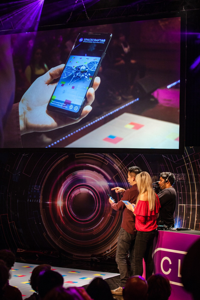 Victor Luo from NASA's Jet Propulsion Lab in California demonstrates an app to Lara Lewington
