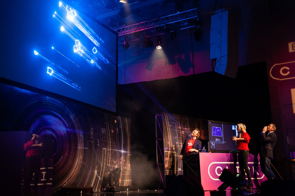 Lara Lewington and Spencer Kelly play 'Asteroids' with laser expert Seb Lee-Delisle