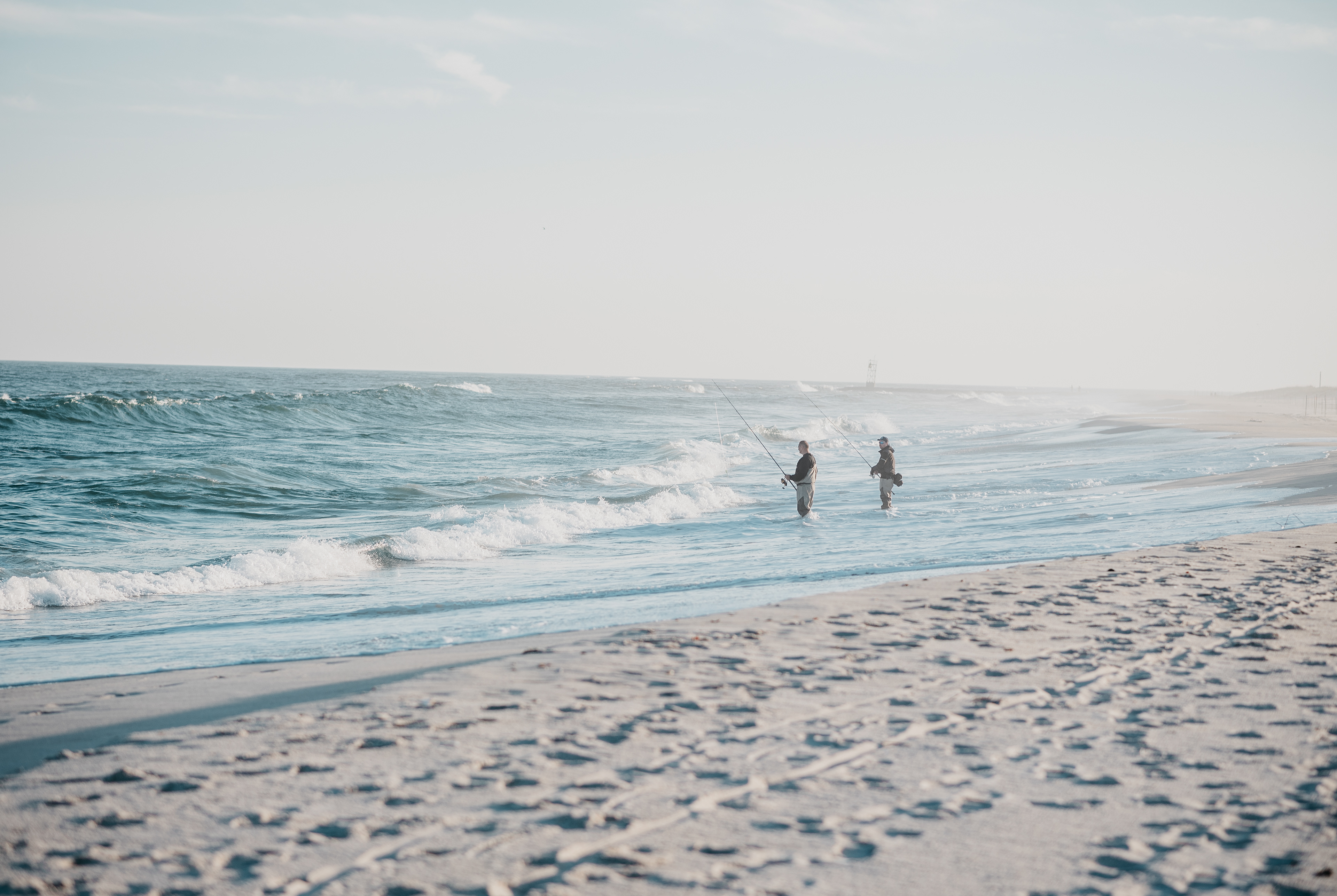 Two men enjoy a day of fishing off the south shore of Long Island, NY, in June 2019. 