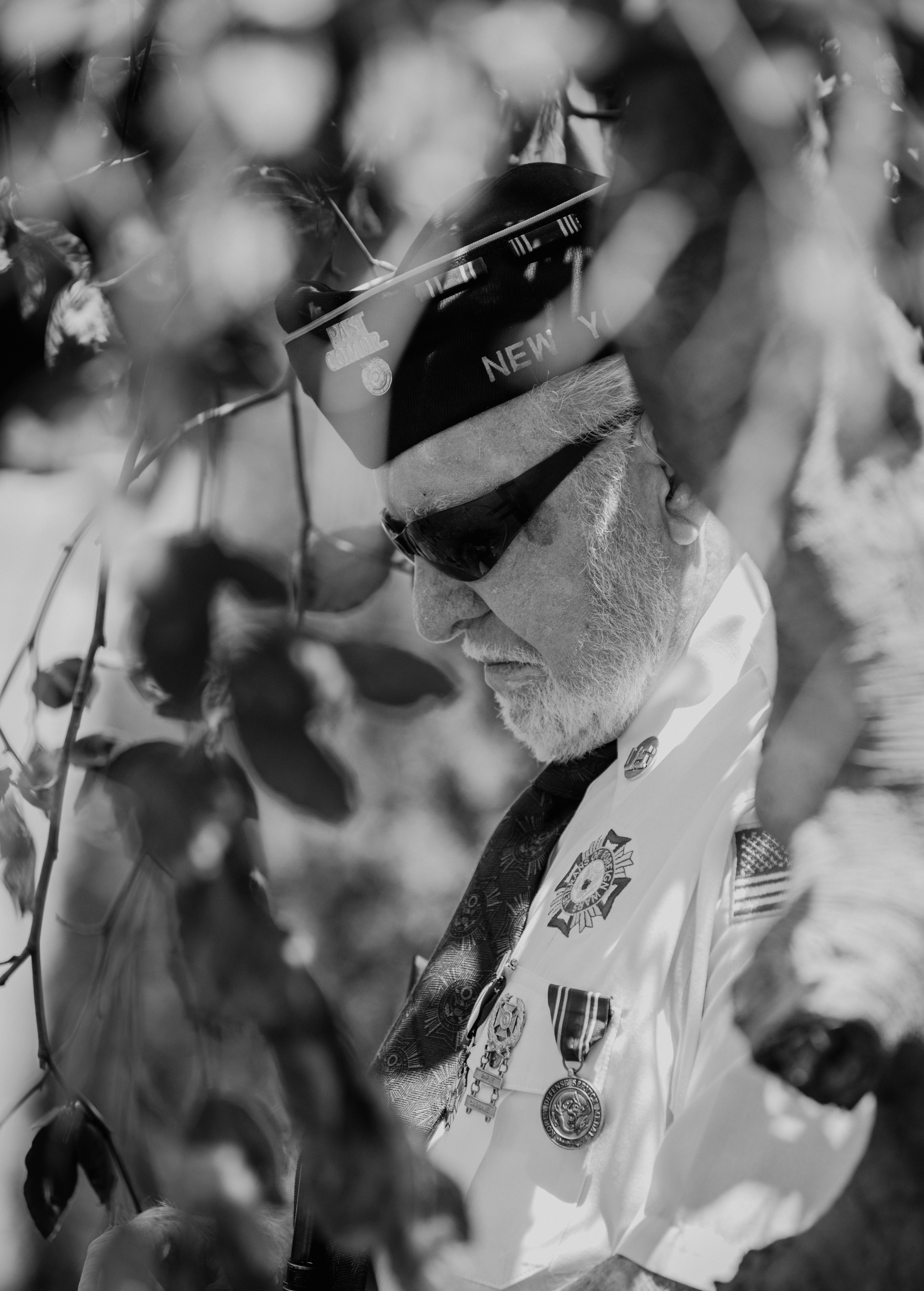Post Commander Edward "Ted" Hemp takes a moment to reflect on his fallen brothers & sisters in arms during Smithtown's Memorial Day Parade on May 31, 2022.