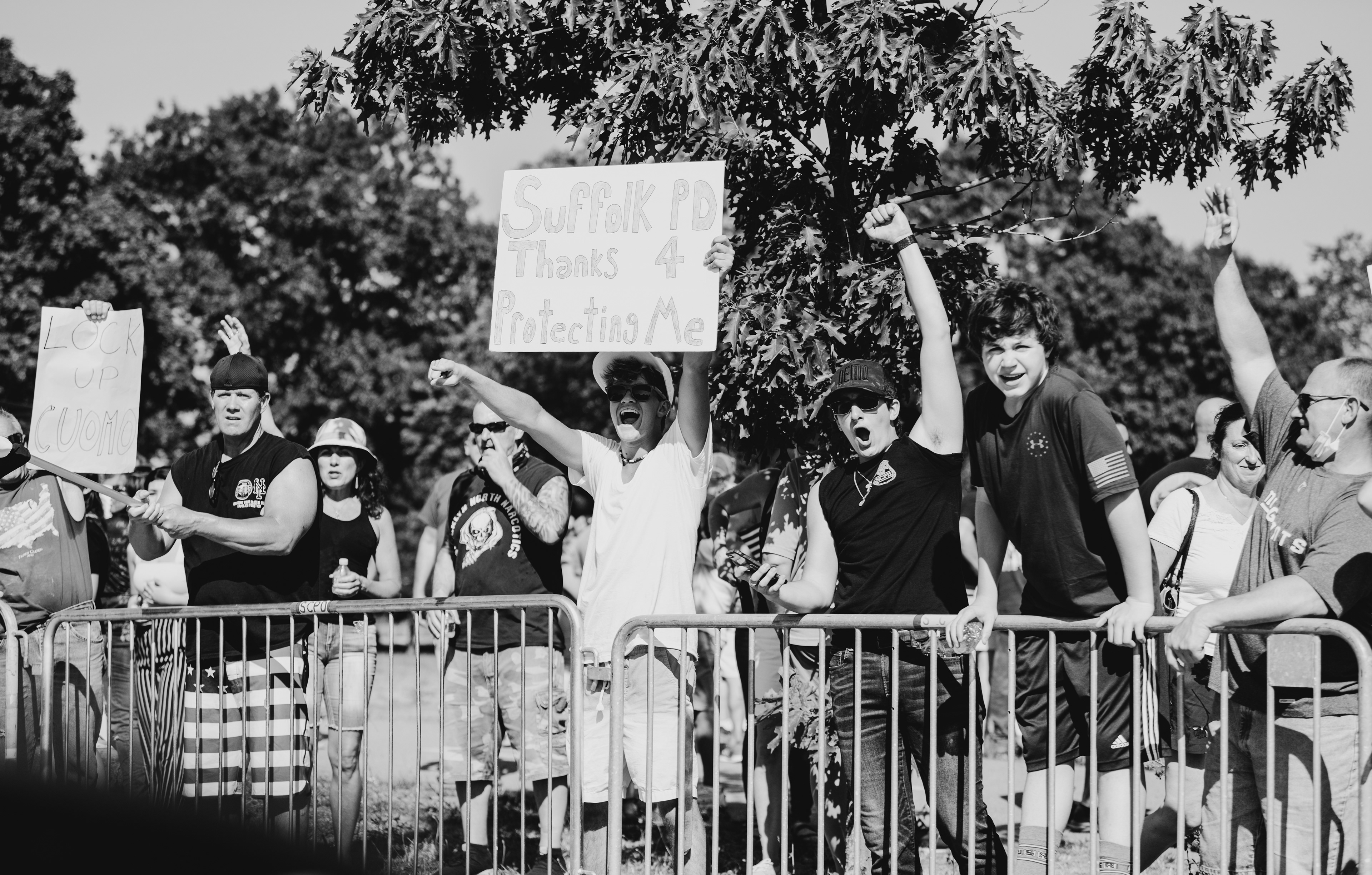A “Back the Blue” rally held in Port Jefferson Station, NY, on June 22, 2020, drew in hundreds of mostly unmasked individuals who showed their thunderous support for law enforcement as they proudly displayed a number of handmade signs and “Thin Blue Line” American Flags. 