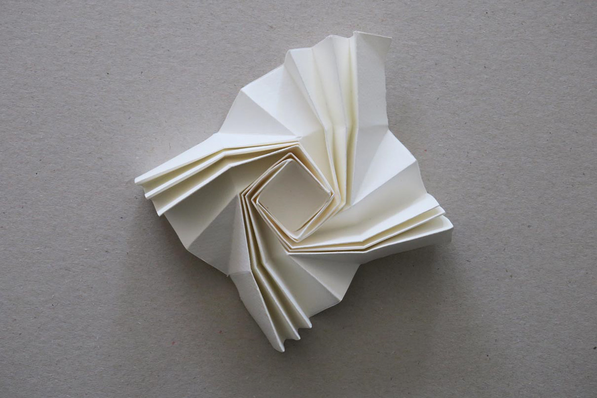 Paper models of twister folds used in aerospace.