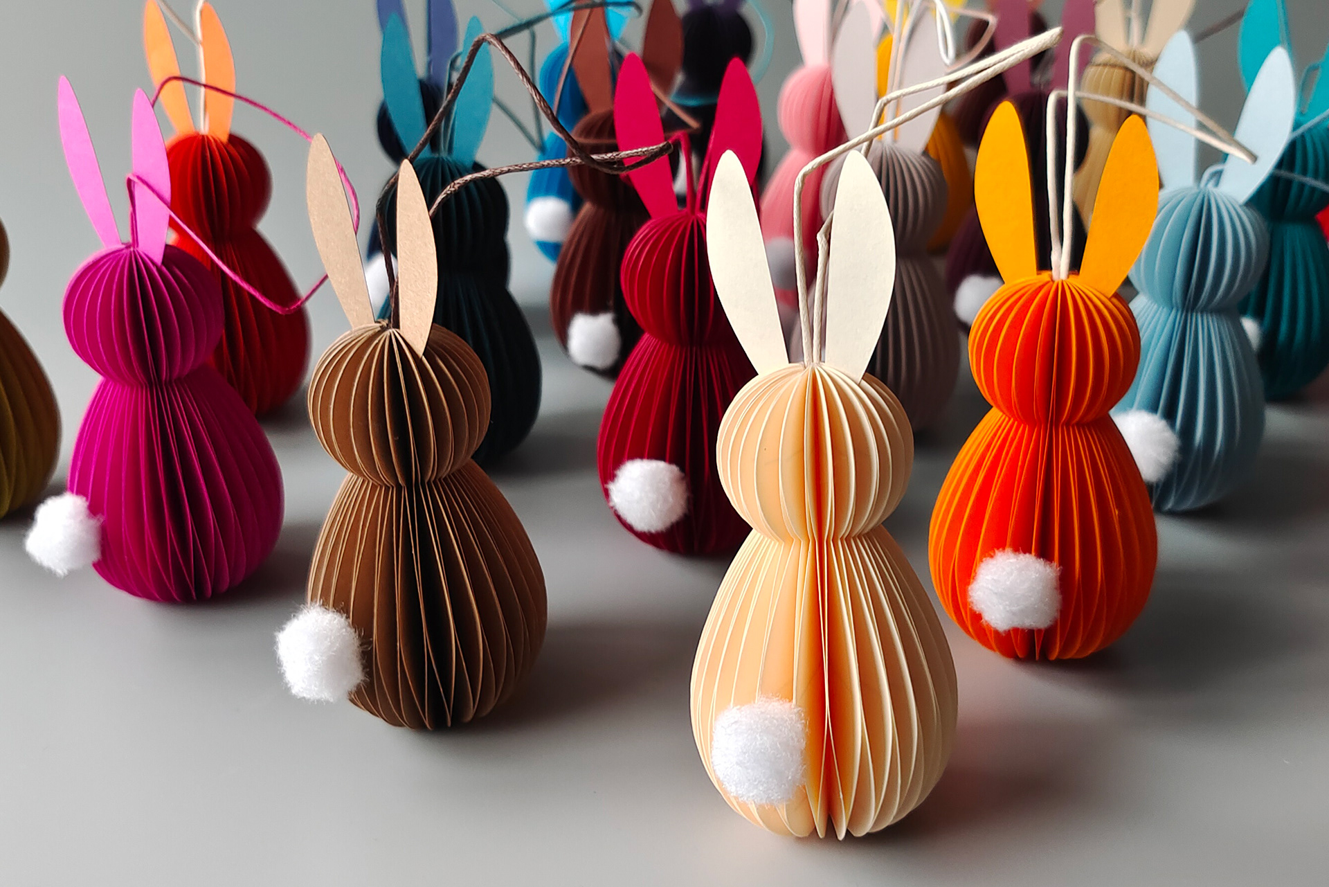 Easter bunnies in fifteen different colors, handcrafted decoration made by Kristina Wißling and available upon request.