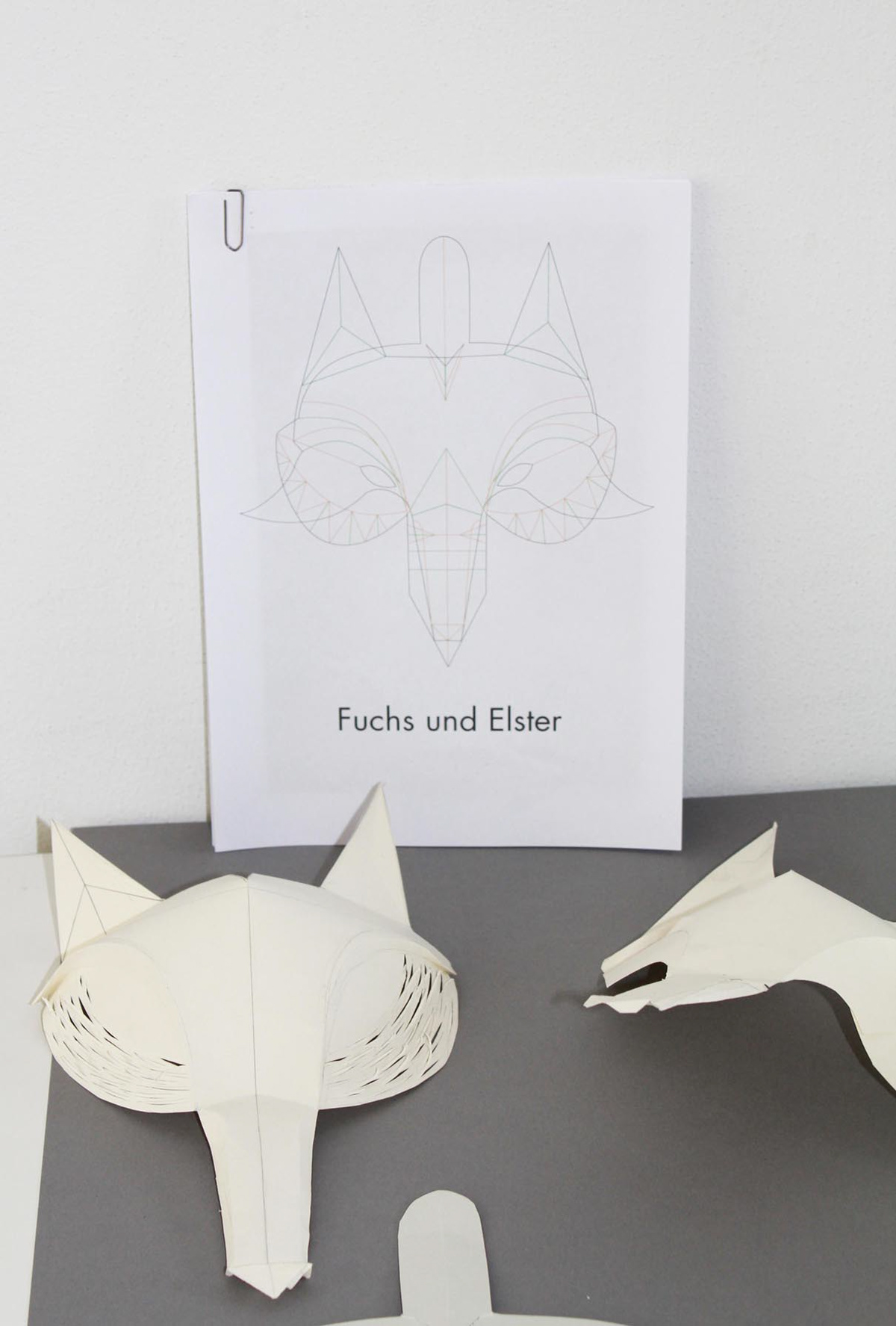 Sketch and prototype of a paper mask by a student during the workshop with Kristina Wißling on folding techniques.