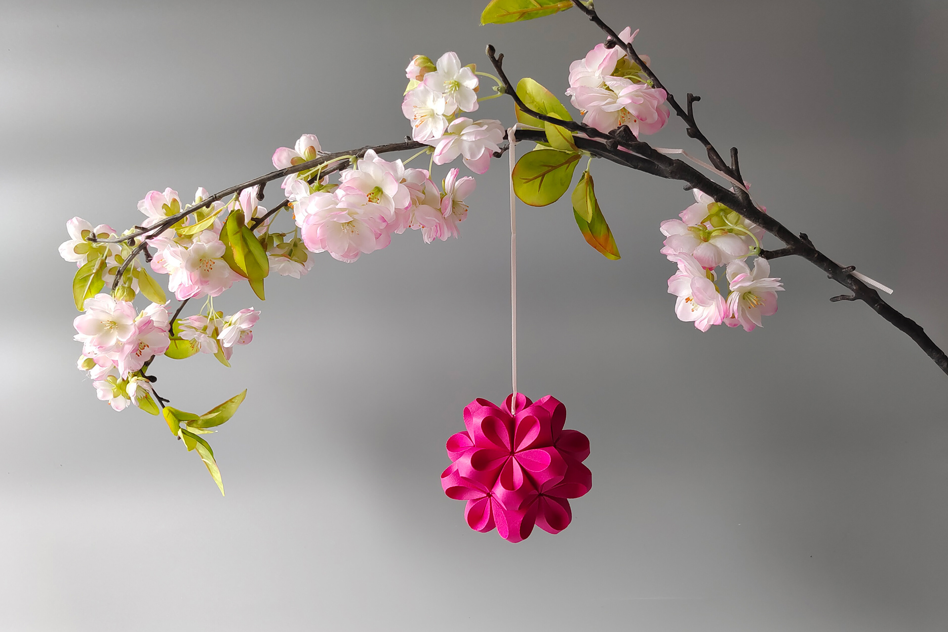 Pink paper flower handmade in germany by designer Kristina Wißling.