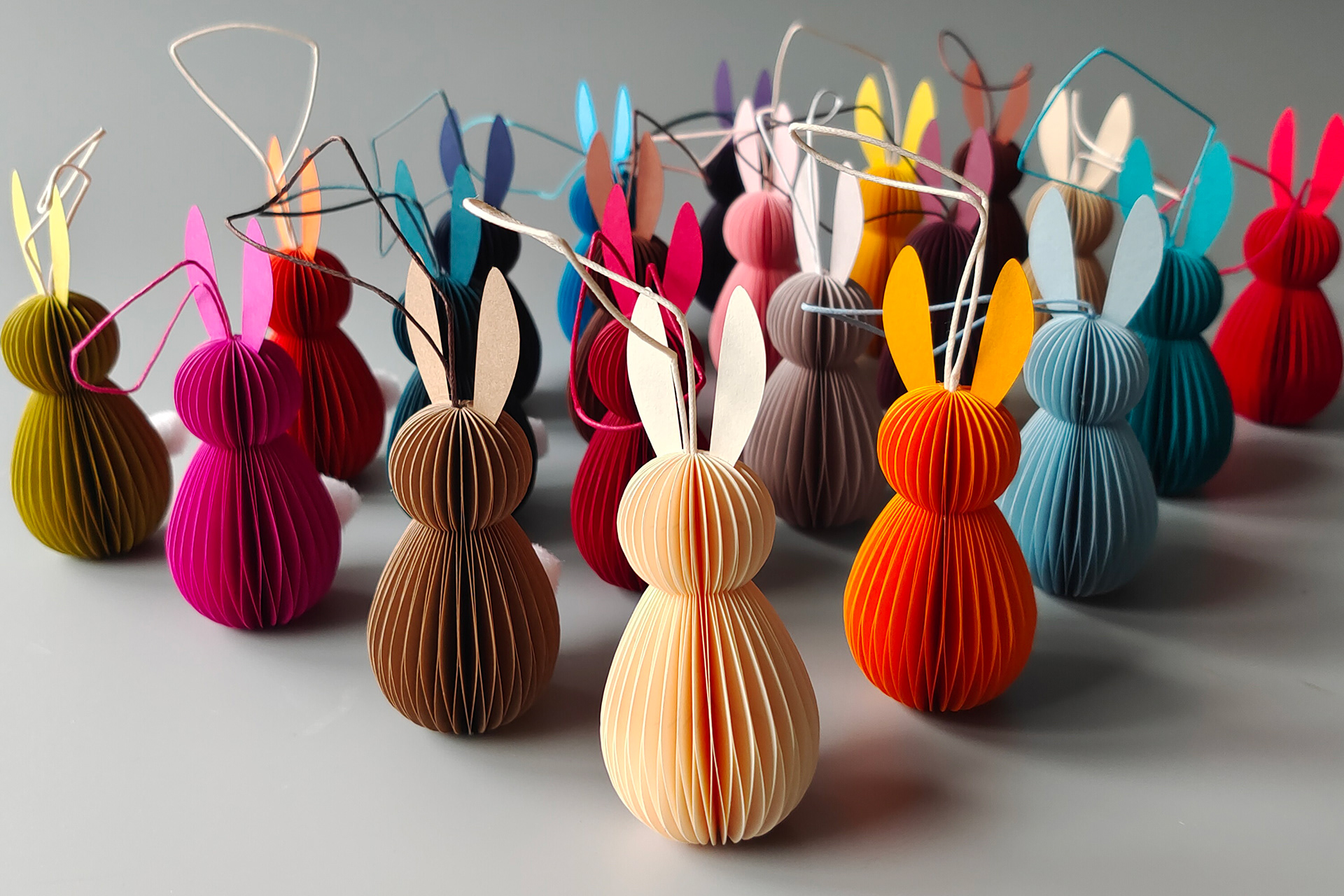 Customized Easter Bunnies. The paper bunnies were made by hand from high-quality artist`s drawing paper using the honeycomb technique and small details.