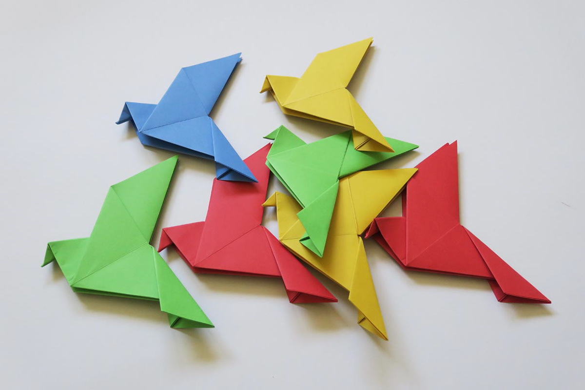 Hand-folded origami birds made of paper for BMW Car IT in Munich.