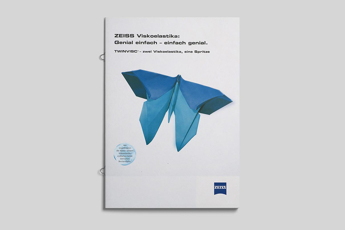 Brochure with a cover illustration of a blue butterfly for an advertising campaign.