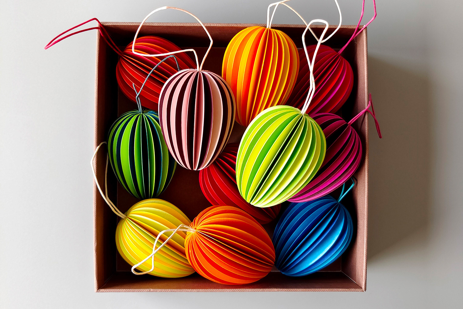Handmade paper Easter eggs by Kristina Wissling in assorted colors. Perfect for Easter decorations.