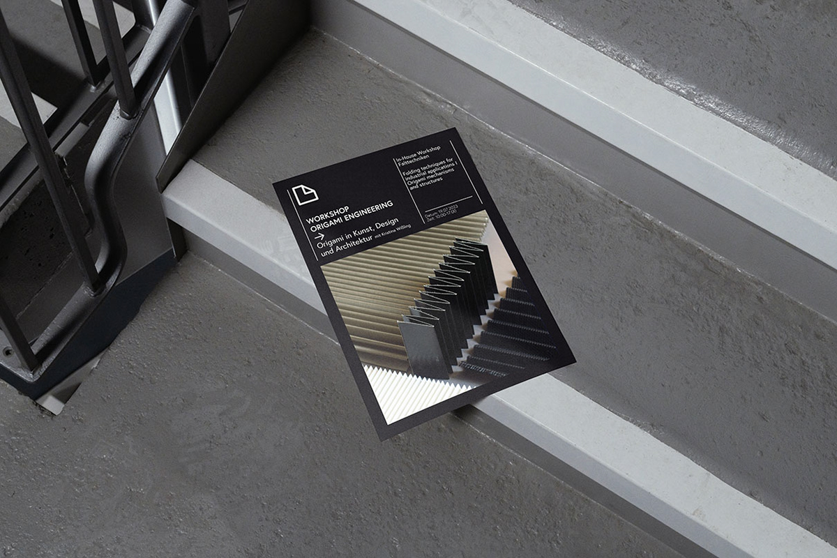 Poster on stair steps for a workshop on origami engineering with designer Kristina Wißling.