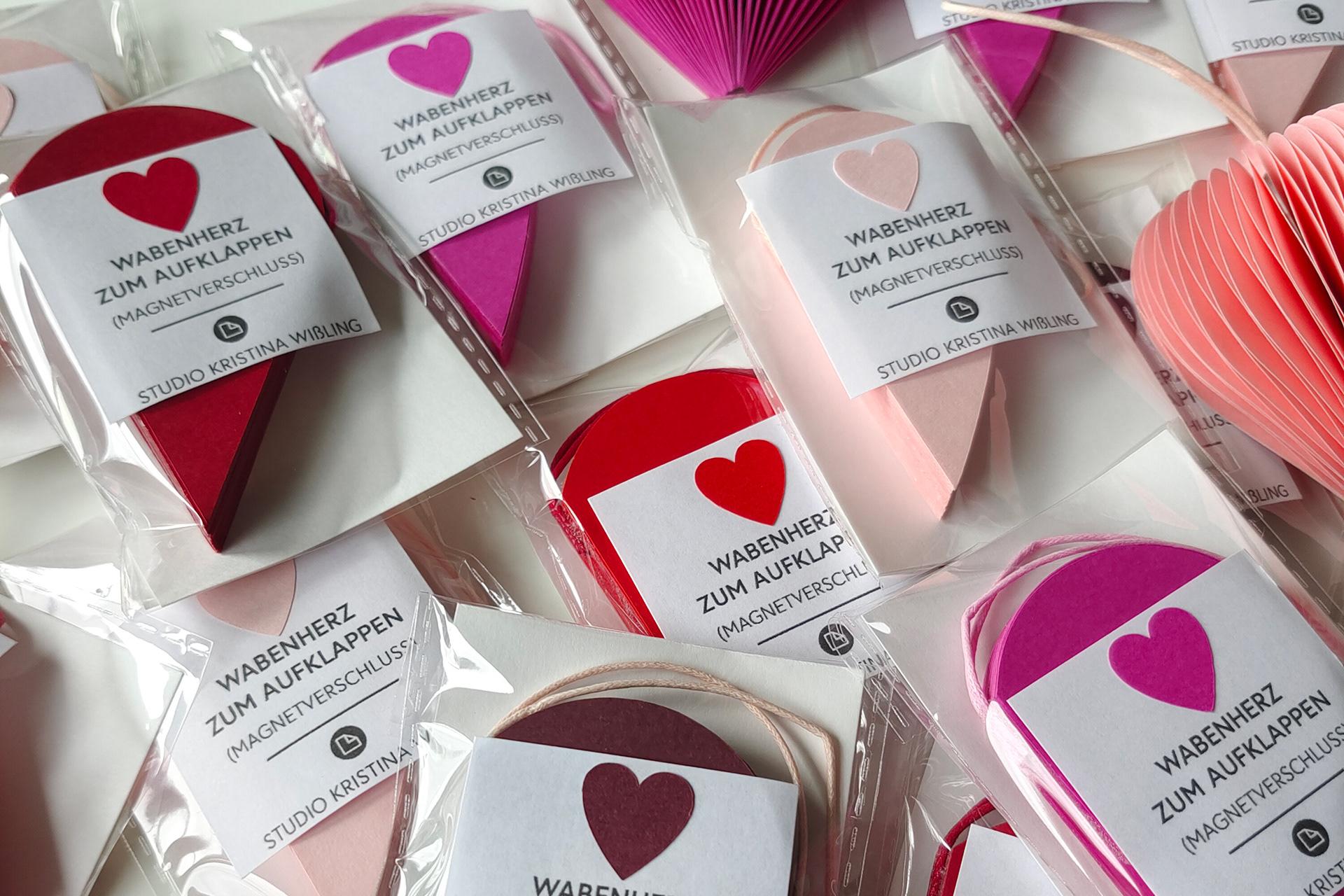 Honeycomb Paper Heart Pendant available in two different sizes in a small packaging -perfect as a gift.