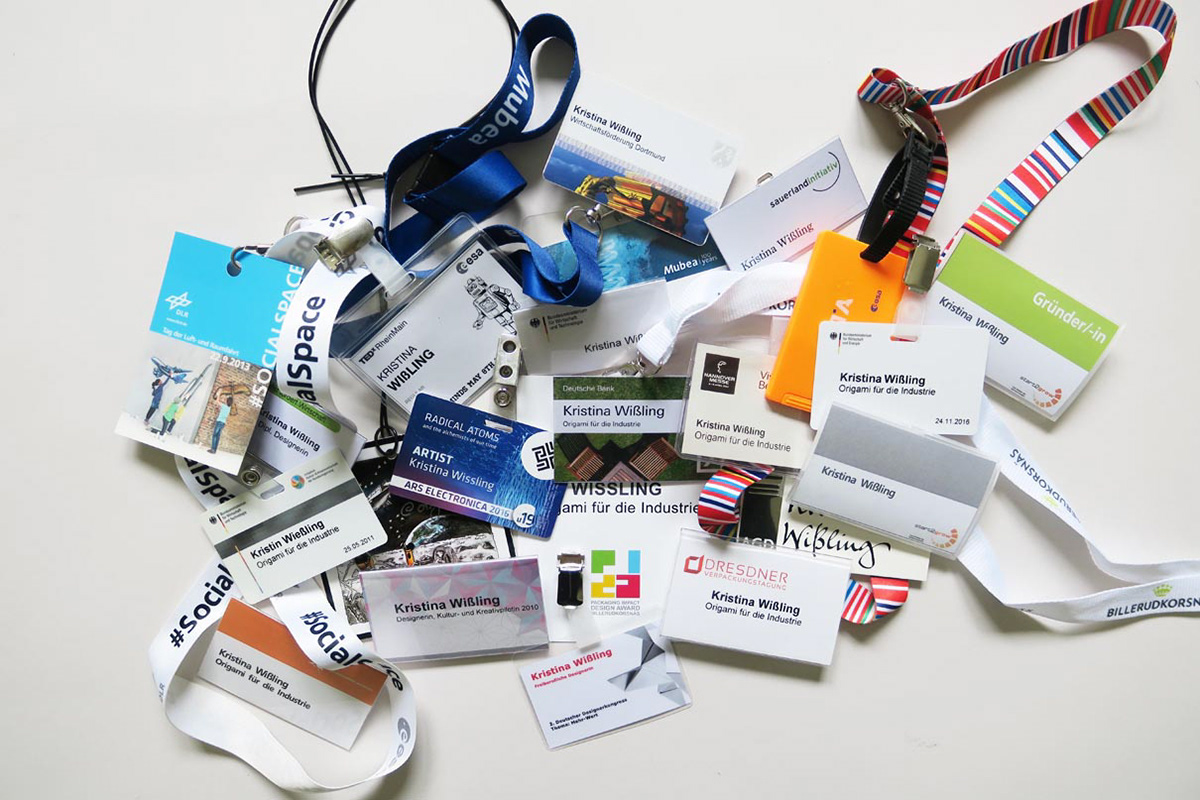 Event name badges from Kristina Wißling from events where she gave a lecture on origami folding techniques.