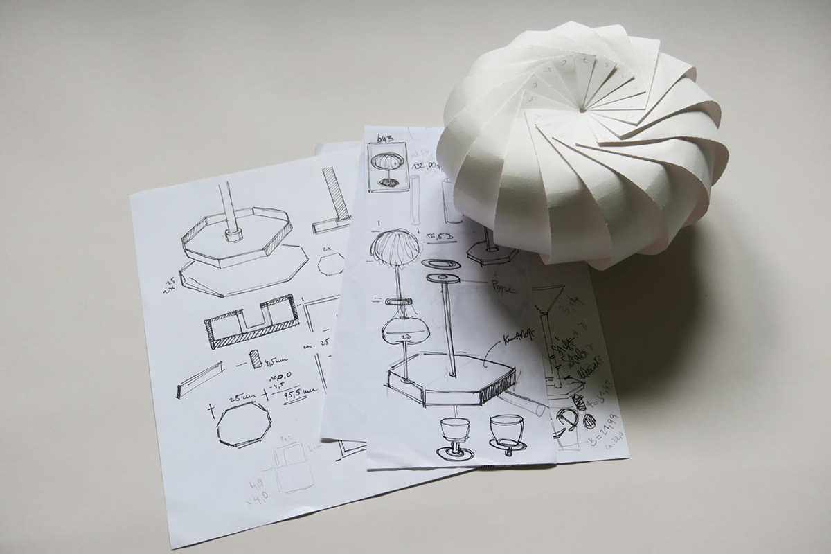 Paper sketch, designs and first paper models for a paper lampshade.