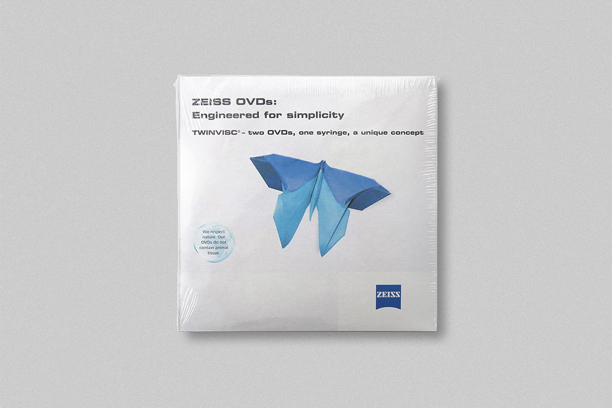 CD cover illustration with a blue origami paper butterfly.