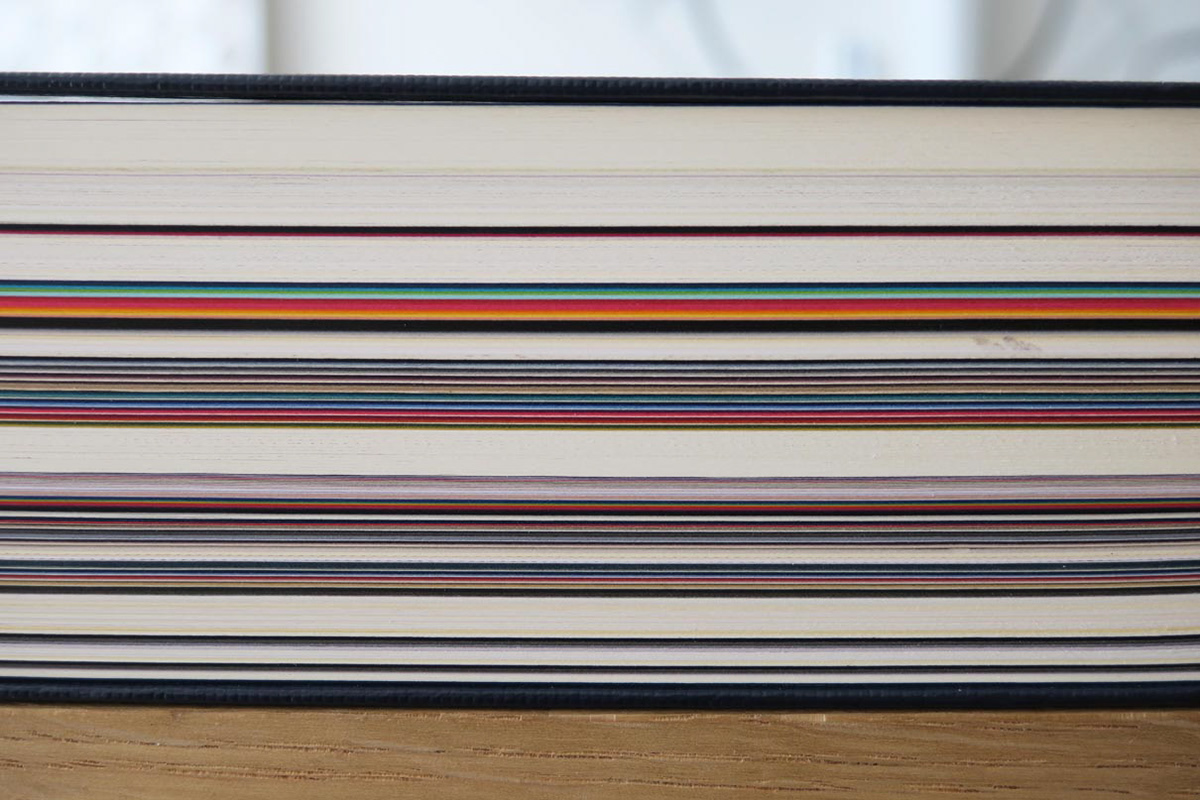 Cross section of a paper sample book.