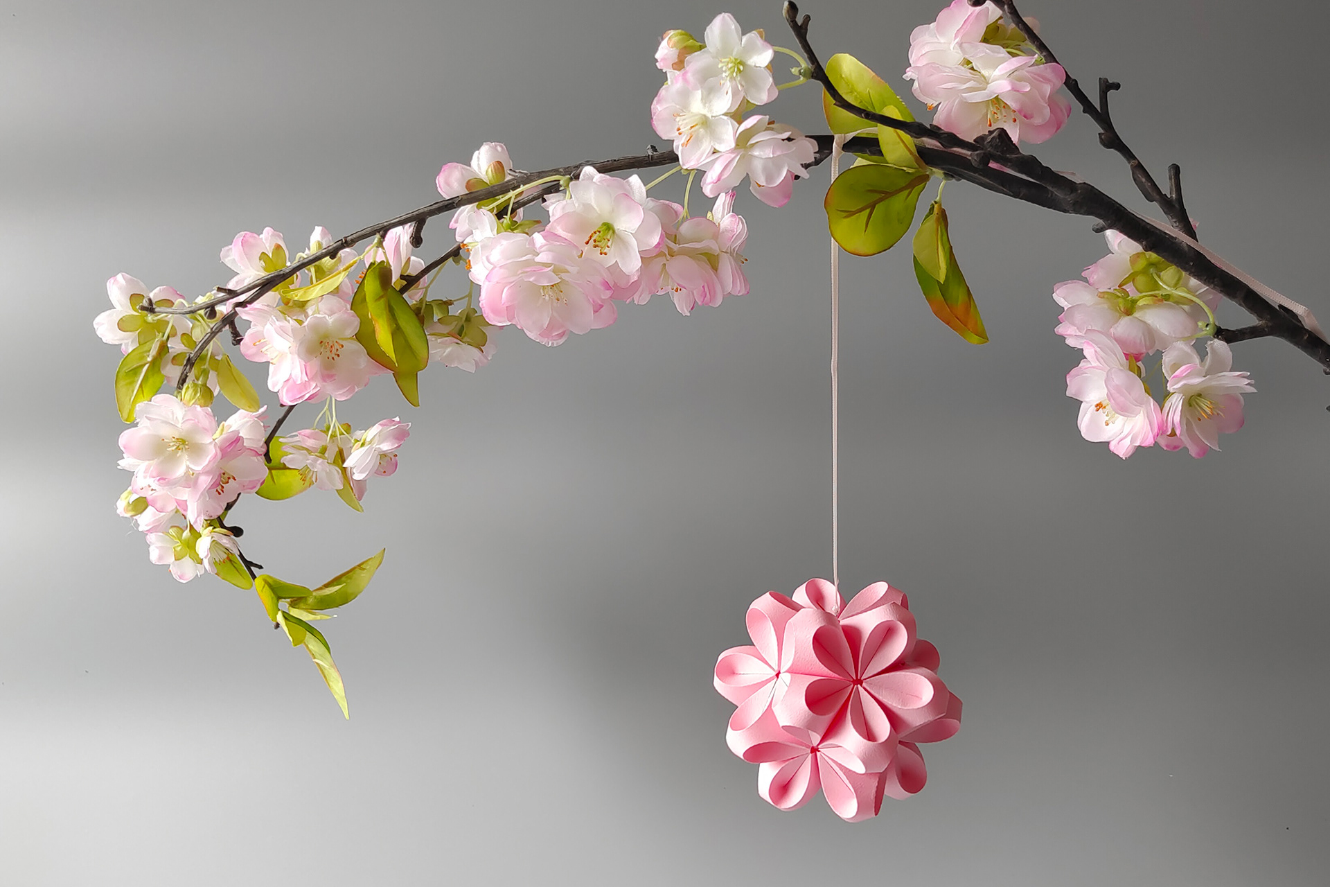 Origami Flower in pink handmade by designer Kristina Wisssling from japanese origami paper.