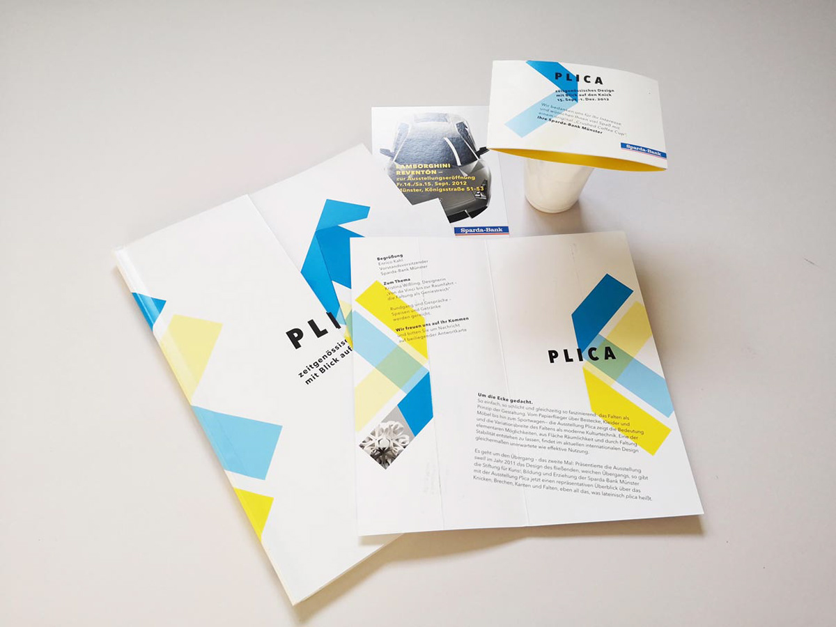 Catalog, flyers, postcards and giveaways for the "Plica" event at the Sparda Bank in Münster.