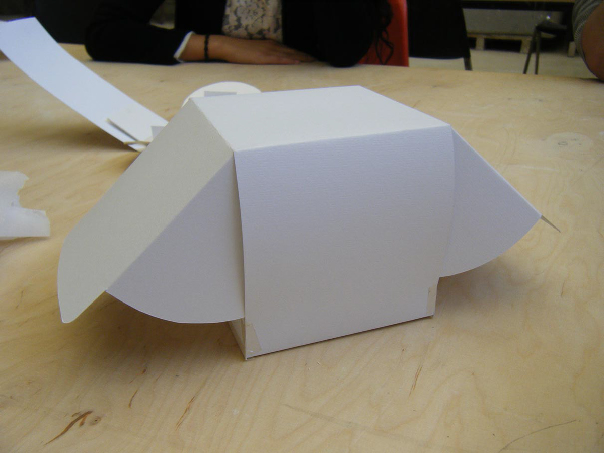 Student work - architectural model of an "emergency shelter made of paper" using folding and tufting techniques.