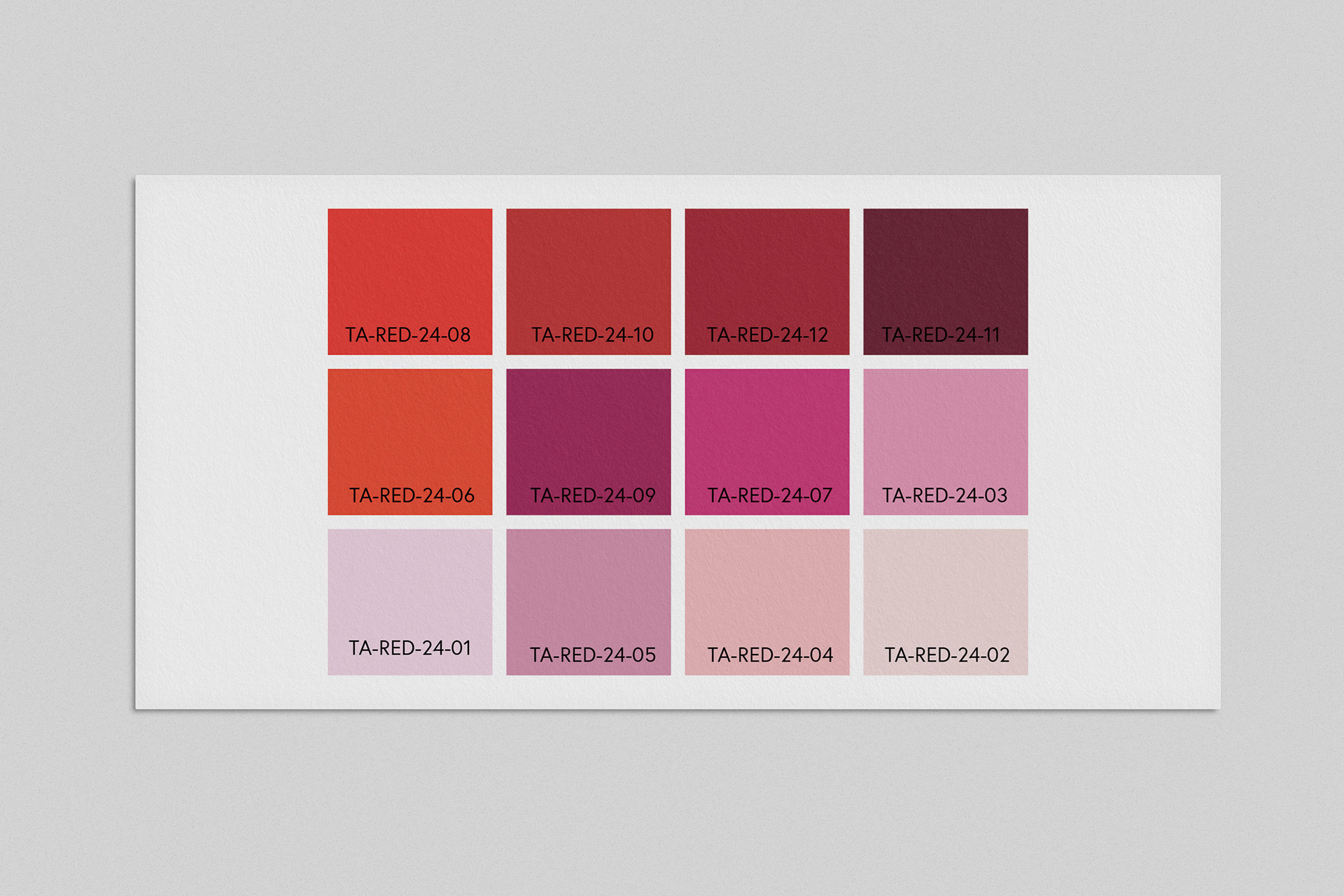 Color palette of twelve different shades of red. The paper blossoms are available in all of the twelve colors.