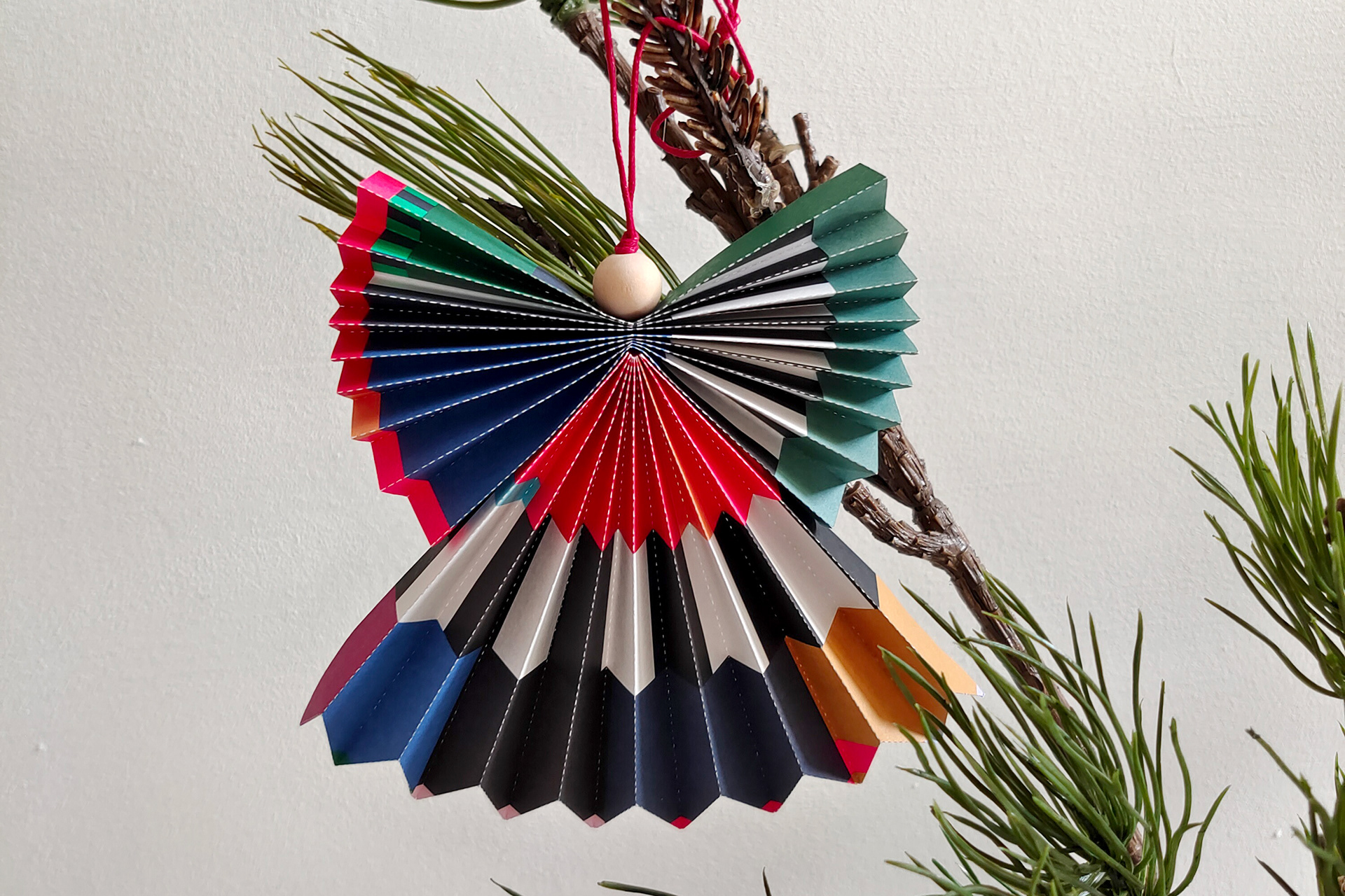 Christmas angels made from wrapping paper, unique pieces by folding expert Kristina Wißling.