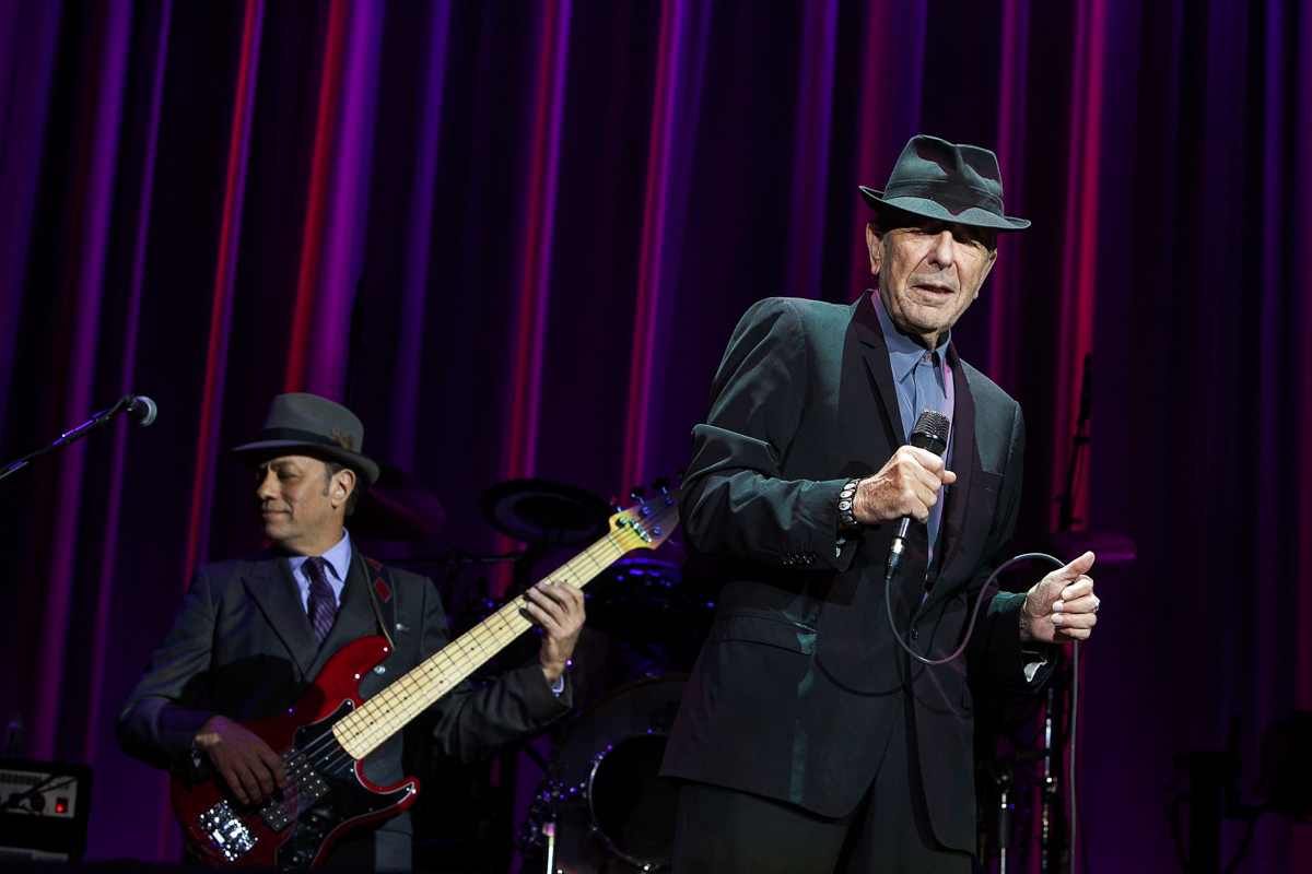 Live performance photography of Leonard Cohen at Ulker Sports Arena Istanbul, concert stage with band and lighting