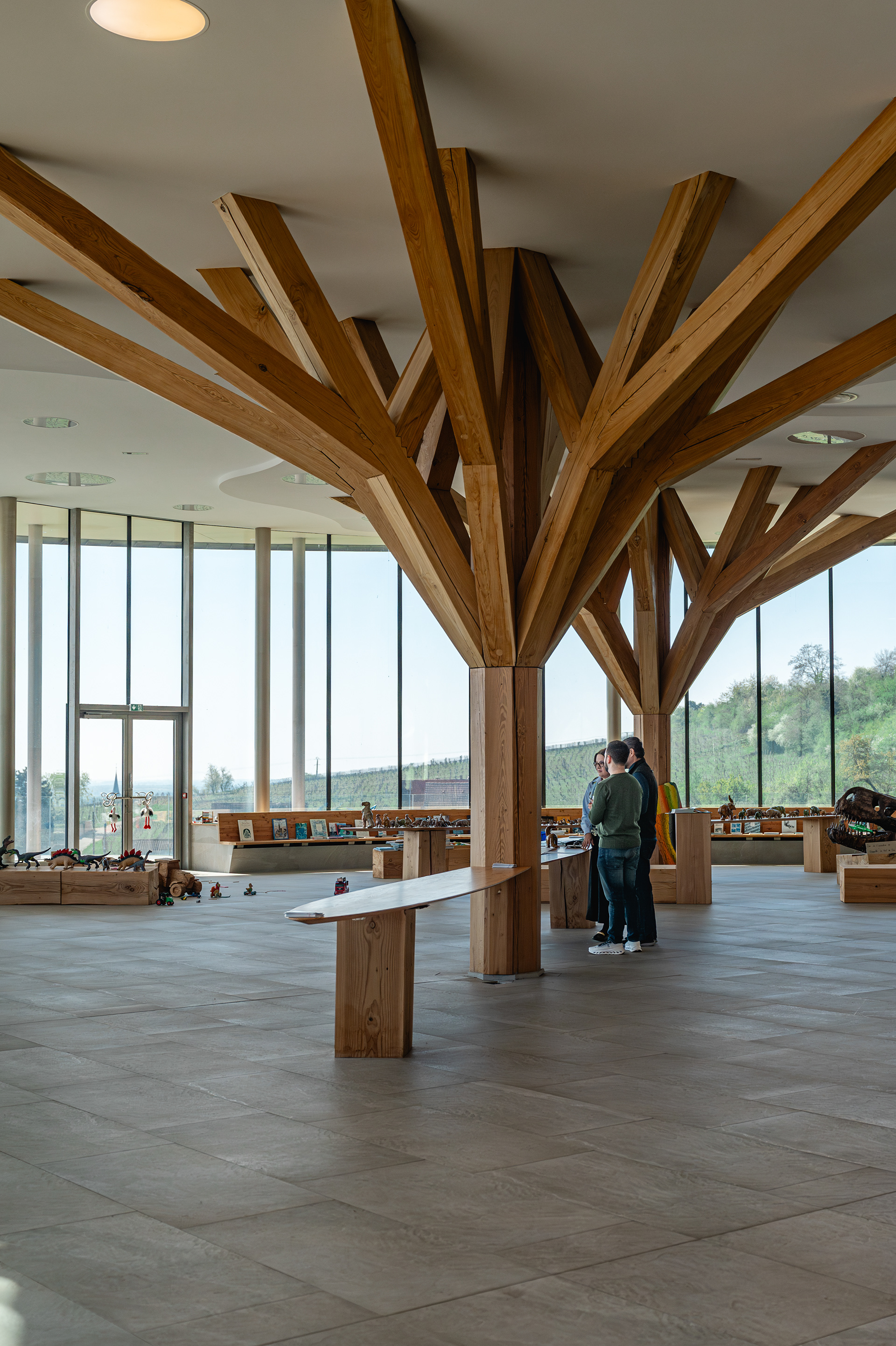 Tree-shaped wooden columns in the Rolly Gassmann tasting hall