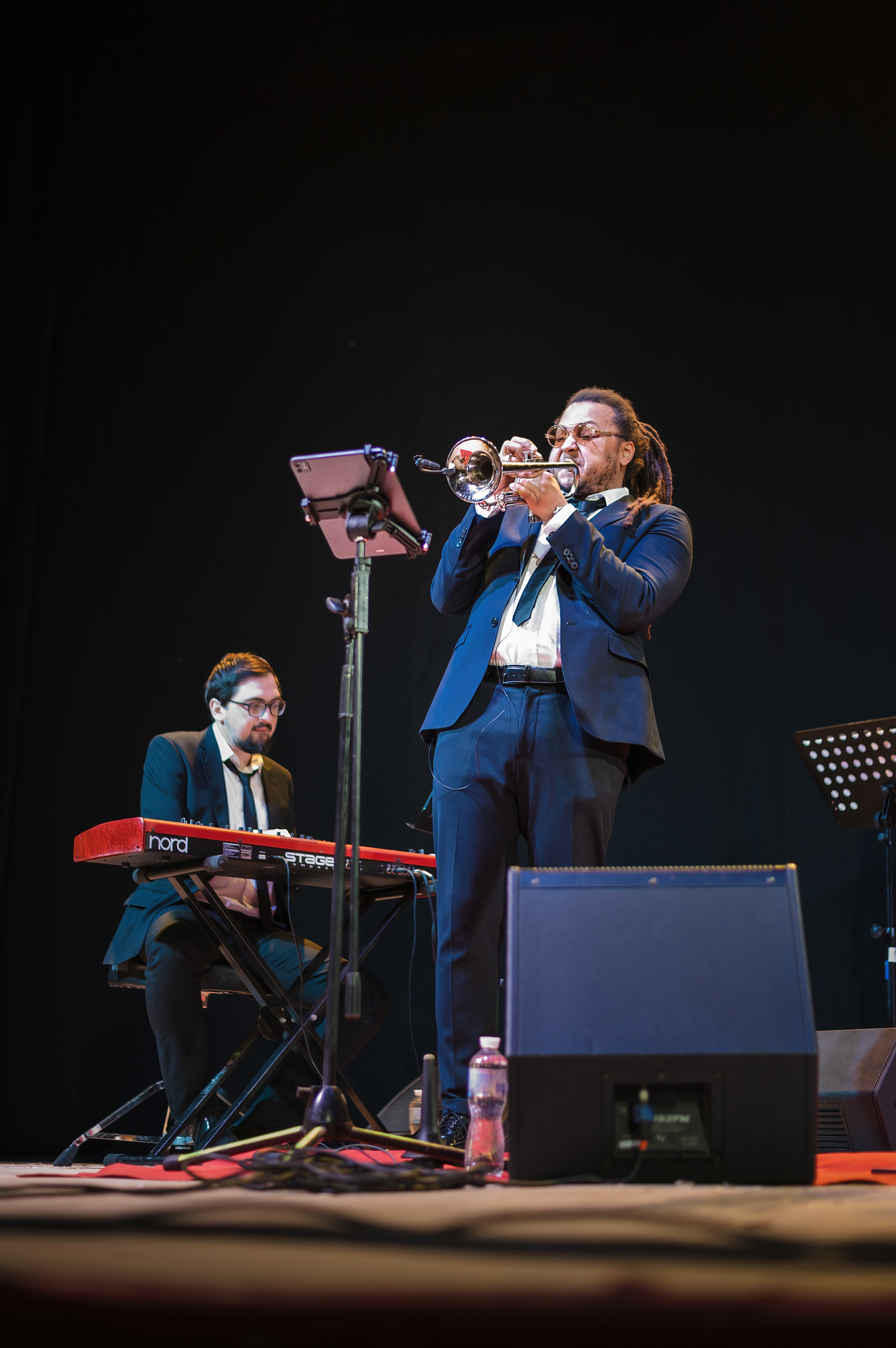 Trumpet player and keyboardist at a Christmas jazz concert at the Dnipro Philharmonic
