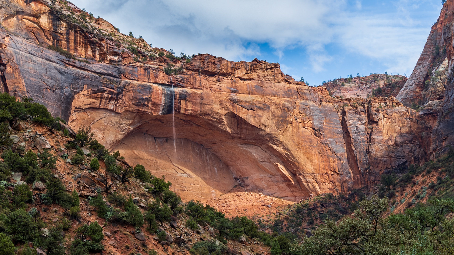 Follow Utah Highway 9, the Zion-Mt Carmel Highway, and you will see this magnificent arch just to the east as you enter the Zion-Mt Carmel Tunnel.