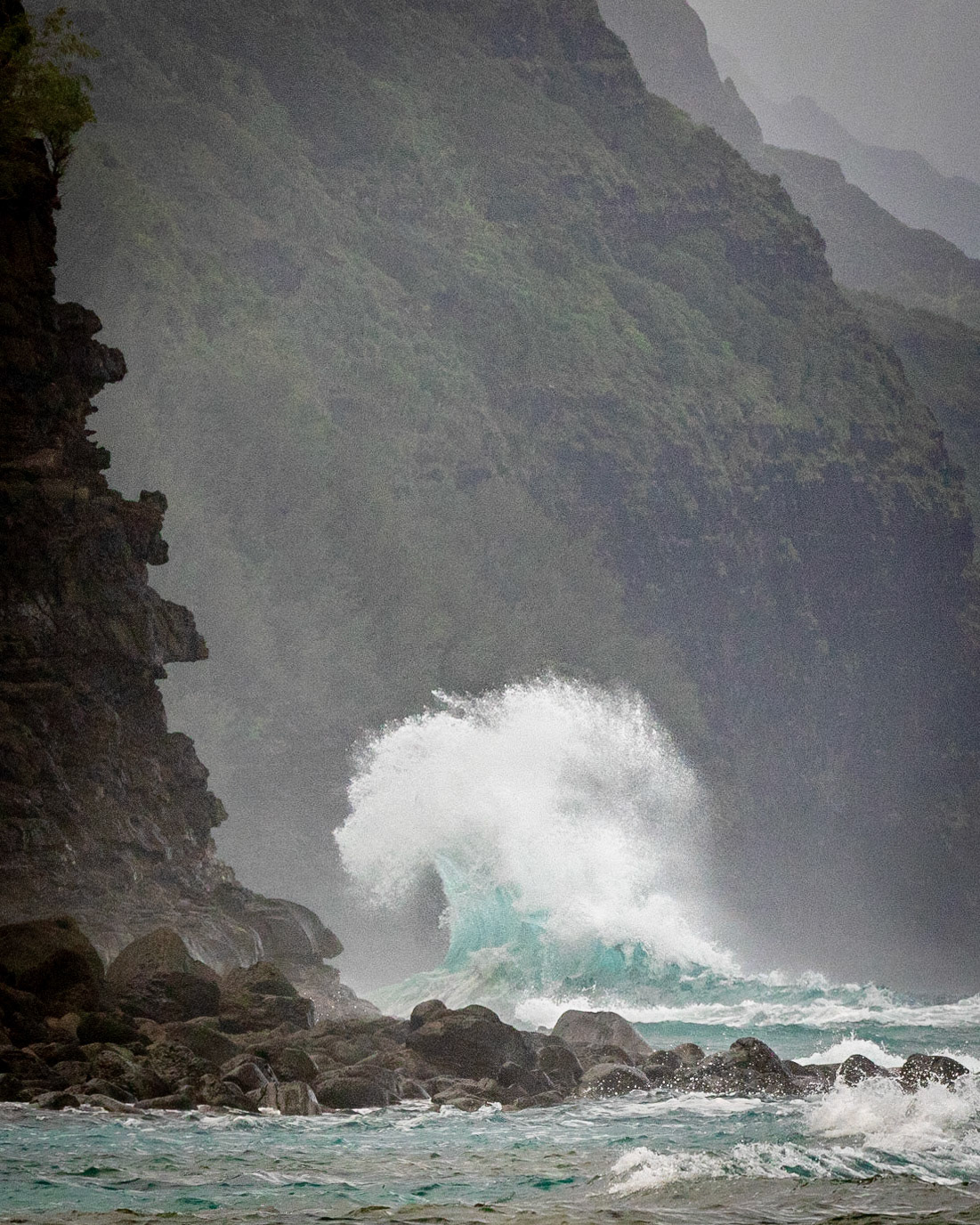 When the tide and wave action is favorable you can get some awesome action. This is just south of Ke'e Beach on the island of Kaua'i. We are looking south west along the Napali Coast