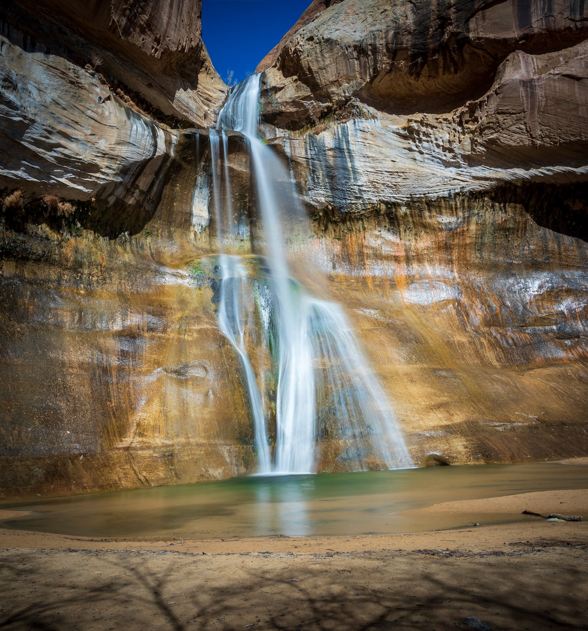 Calf Creek descends into a small pool at Lower Calf Creek Falls.