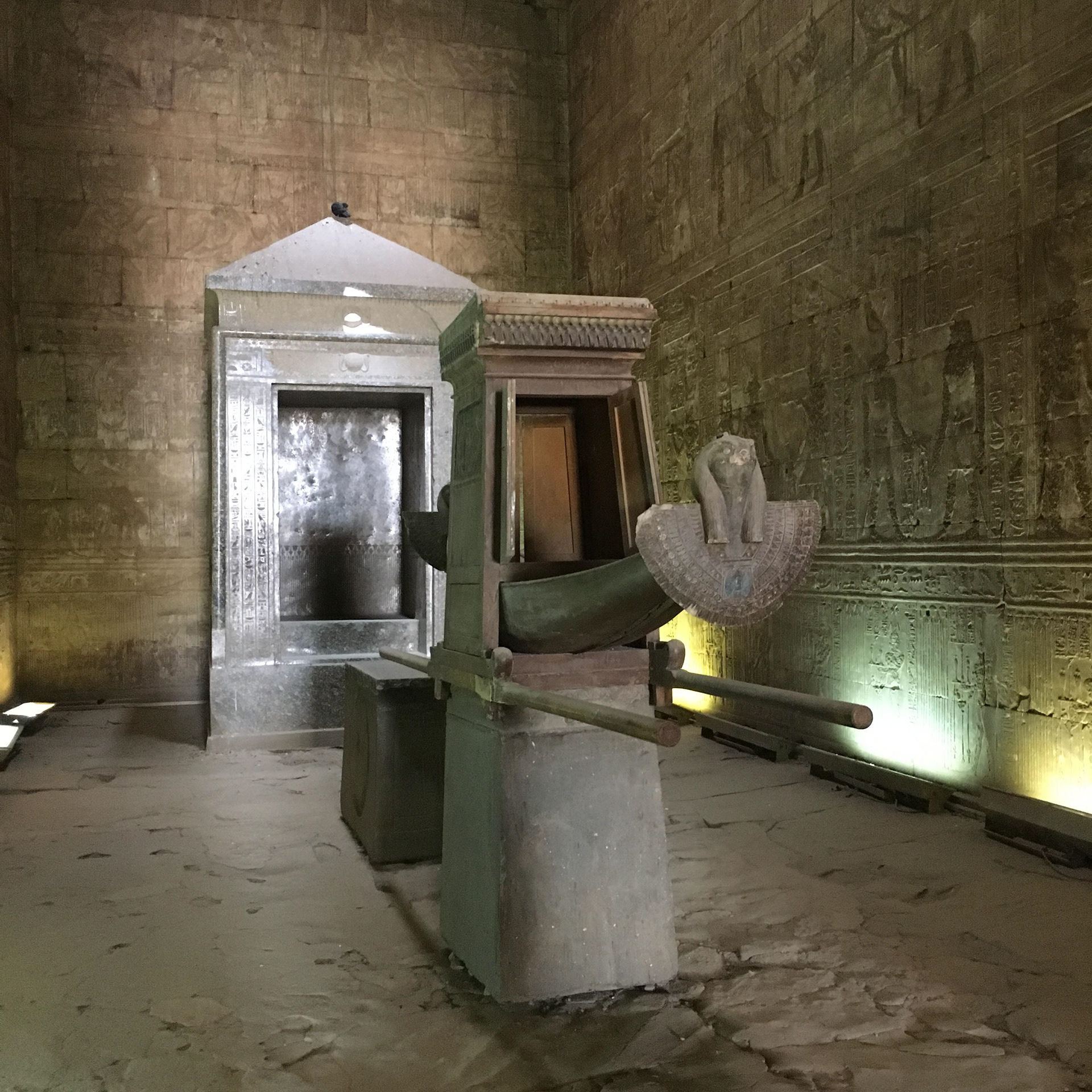 -	The ceremonial boat to carry Horus. Located in the Holy of Holies in Edfu Temple. The nous is behind the boat and is where the golden statue of the deity would reside.
