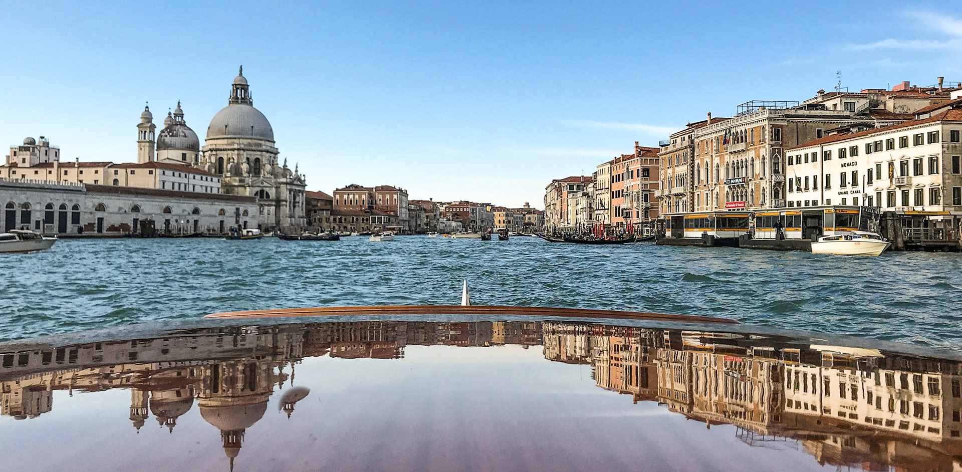 Reflections on a water taxi, Venice