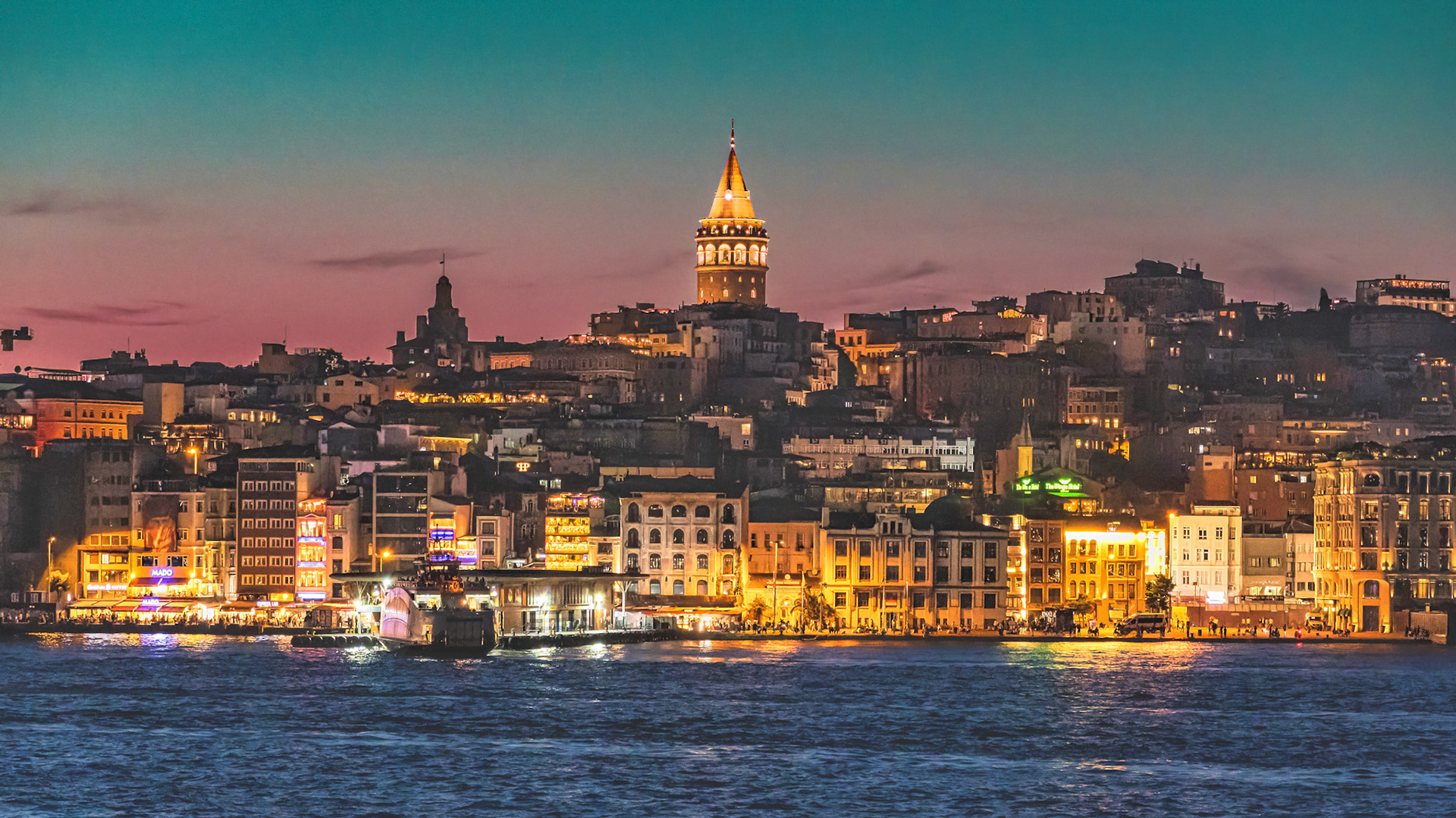 Galata Tower illuminated — standing proud over a city that never stops glowing.