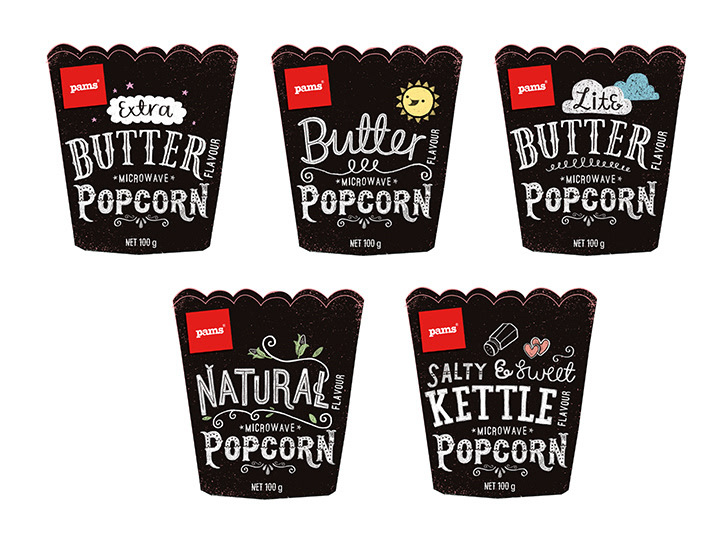 this image shows an illustration of a microwave popcorn container. It's black with chalkboard style hand lettering